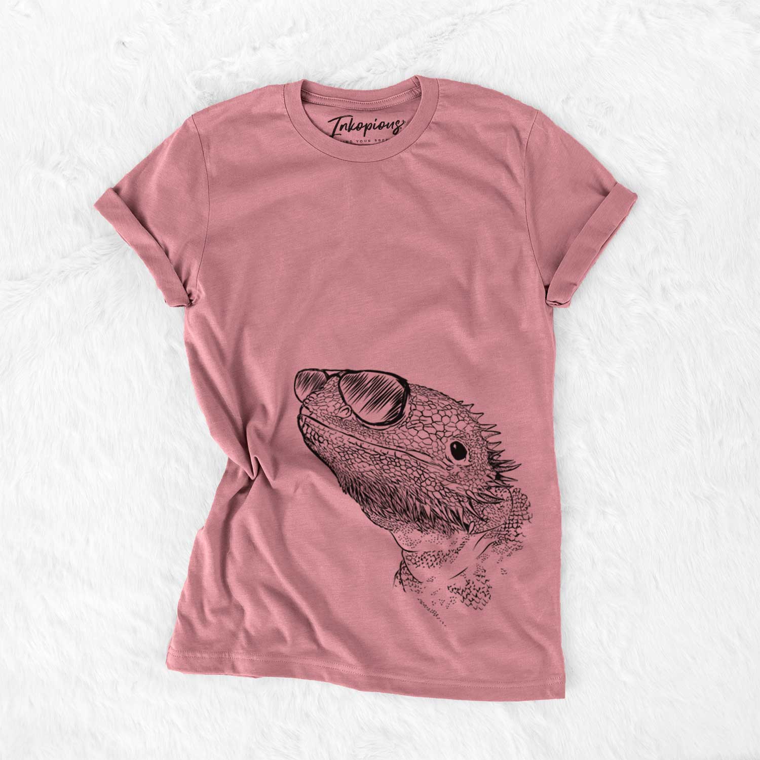 Hand-drawn sketch of Ash the Bearded Dragon wearing aviator sunglasses on a Mauve Unisex crewneck