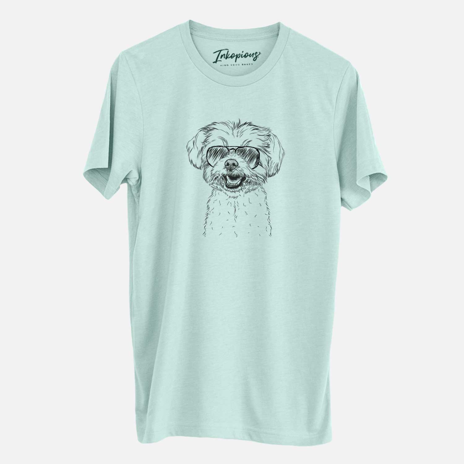 Hand-drawn sketch of Aspen the Morkie wearing aviator sunglasses on a Heather Sage Unisex crewneck