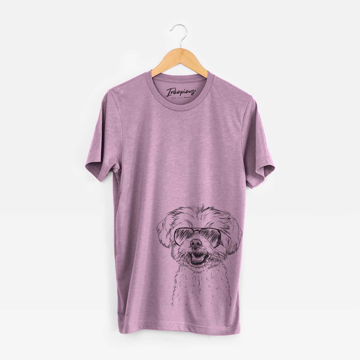 Hand-drawn sketch of Aspen the Morkie wearing aviator sunglasses on an Orchid Unisex crewneck