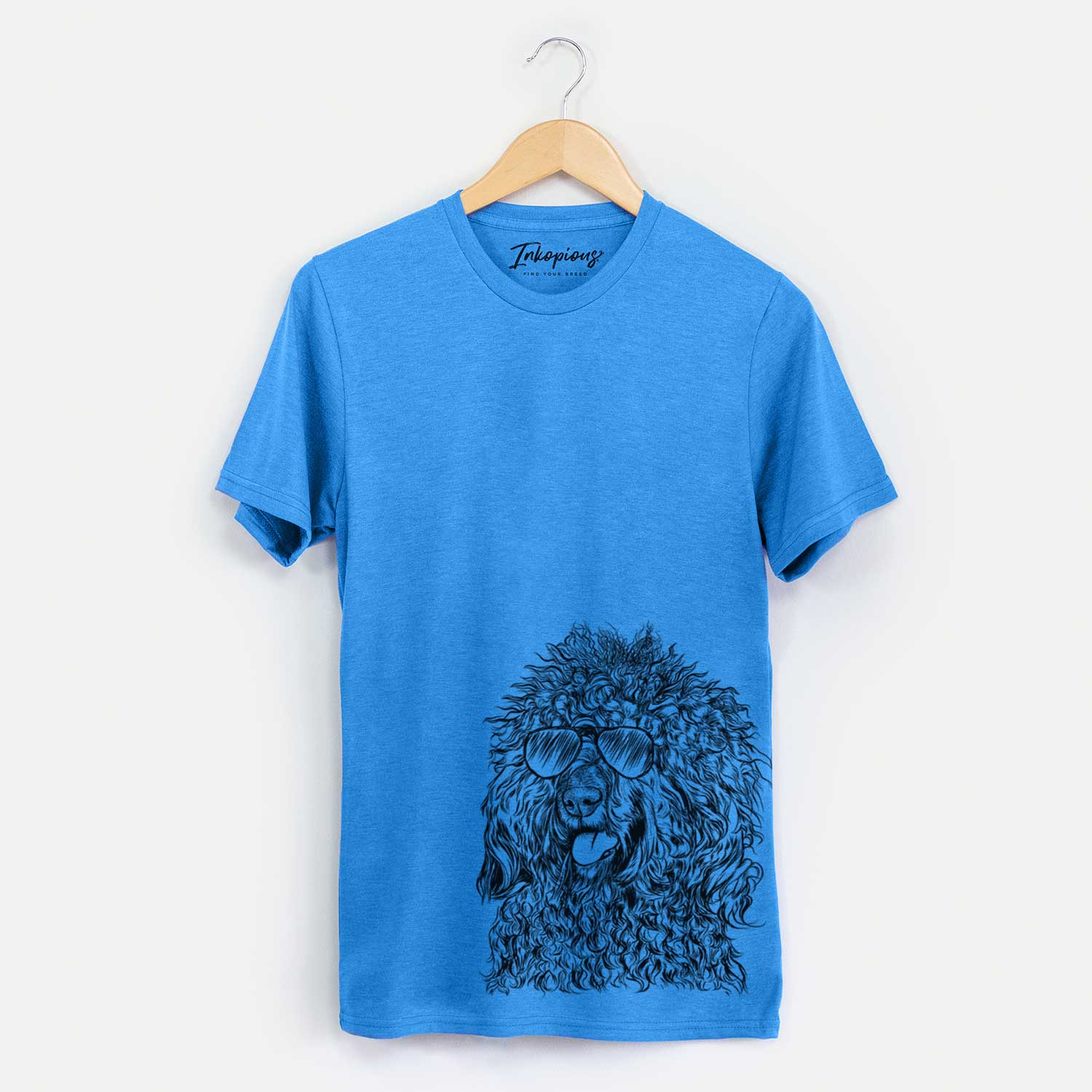 Hand-drawn sketch of Babs the Barbet wearing aviator sunglasses on a Blue Unisex crewneck