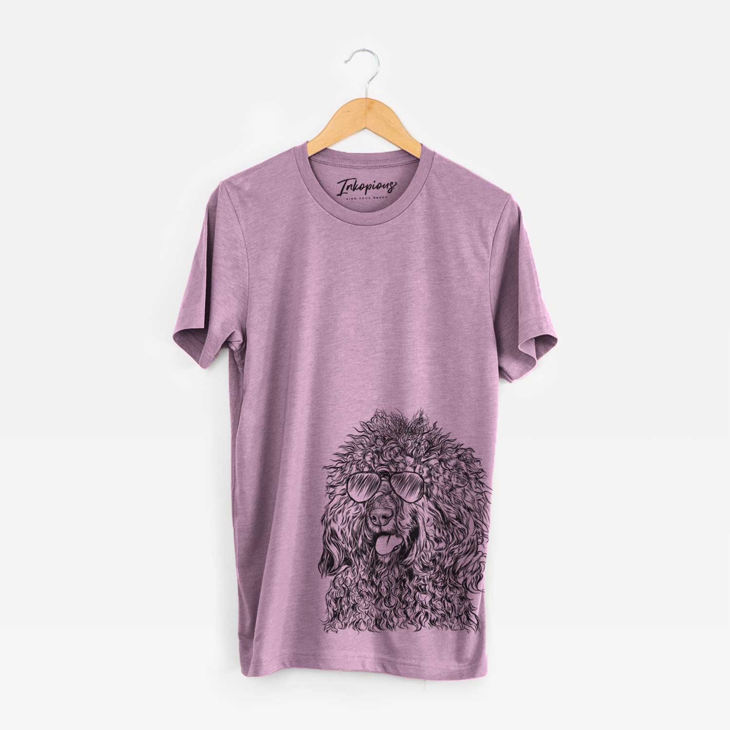 Hand-drawn sketch of Babs the Barbet wearing aviator sunglasses on an Orchid Bella Canvas Unisex Crewneck