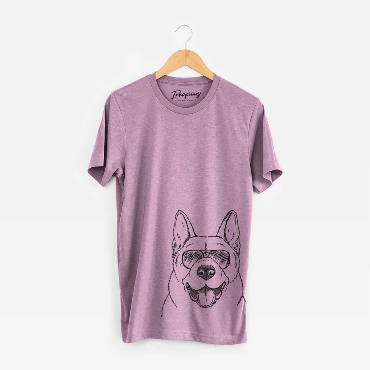 Hand-drawn sketch of Baku the Akita wearing aviator sunglasses on an Orchid Unisex crewneck