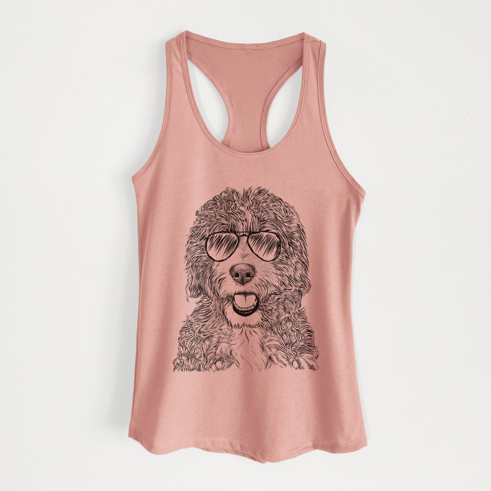 Hand-drawn sketch of Bash the Bernedoodle wearing aviator sunglasses on a Desert Pink Women's racerback tanktop