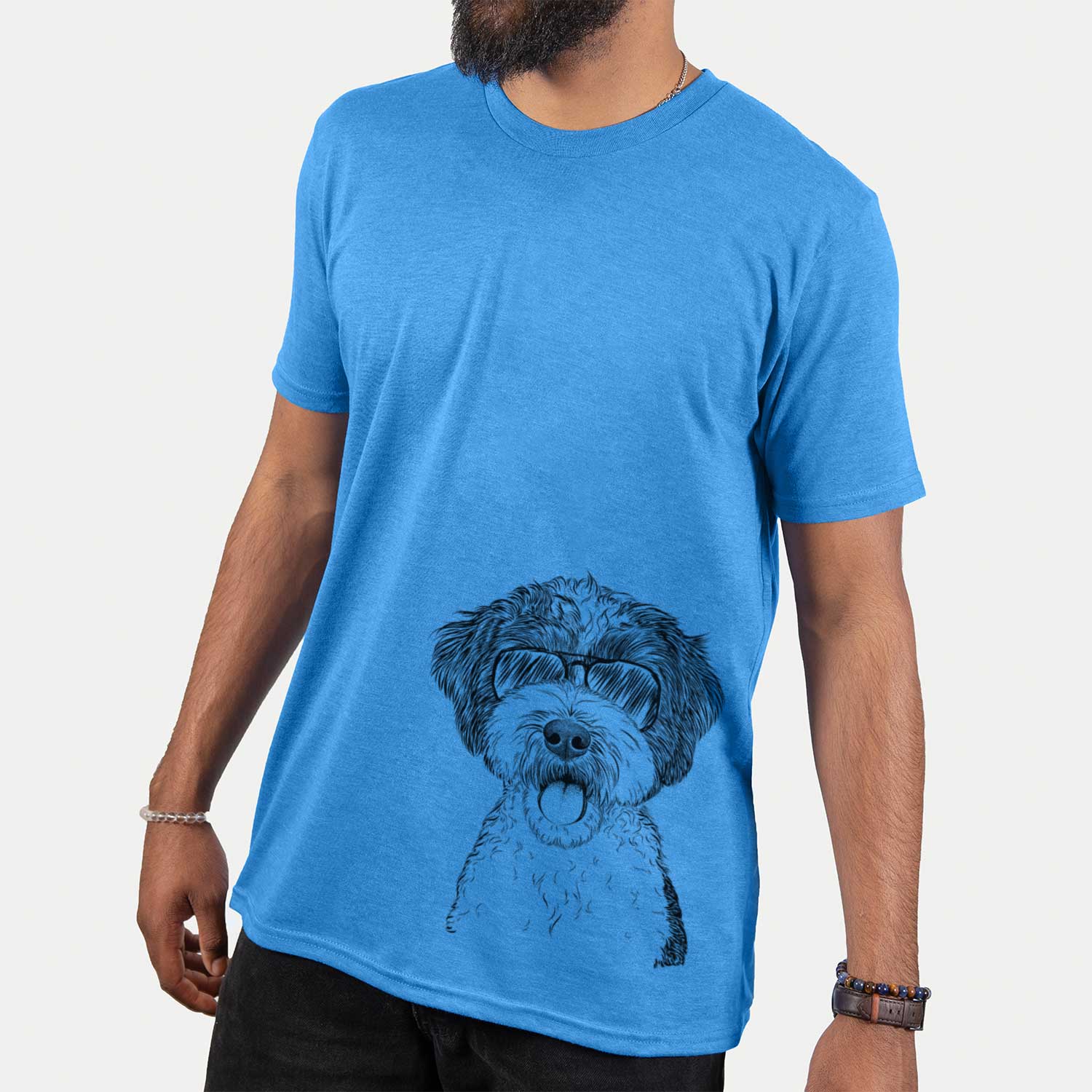 Hand-drawn sketch of Bella the Cockapoo wearing aviator sunglasses on a Blue Unisex crewneck
