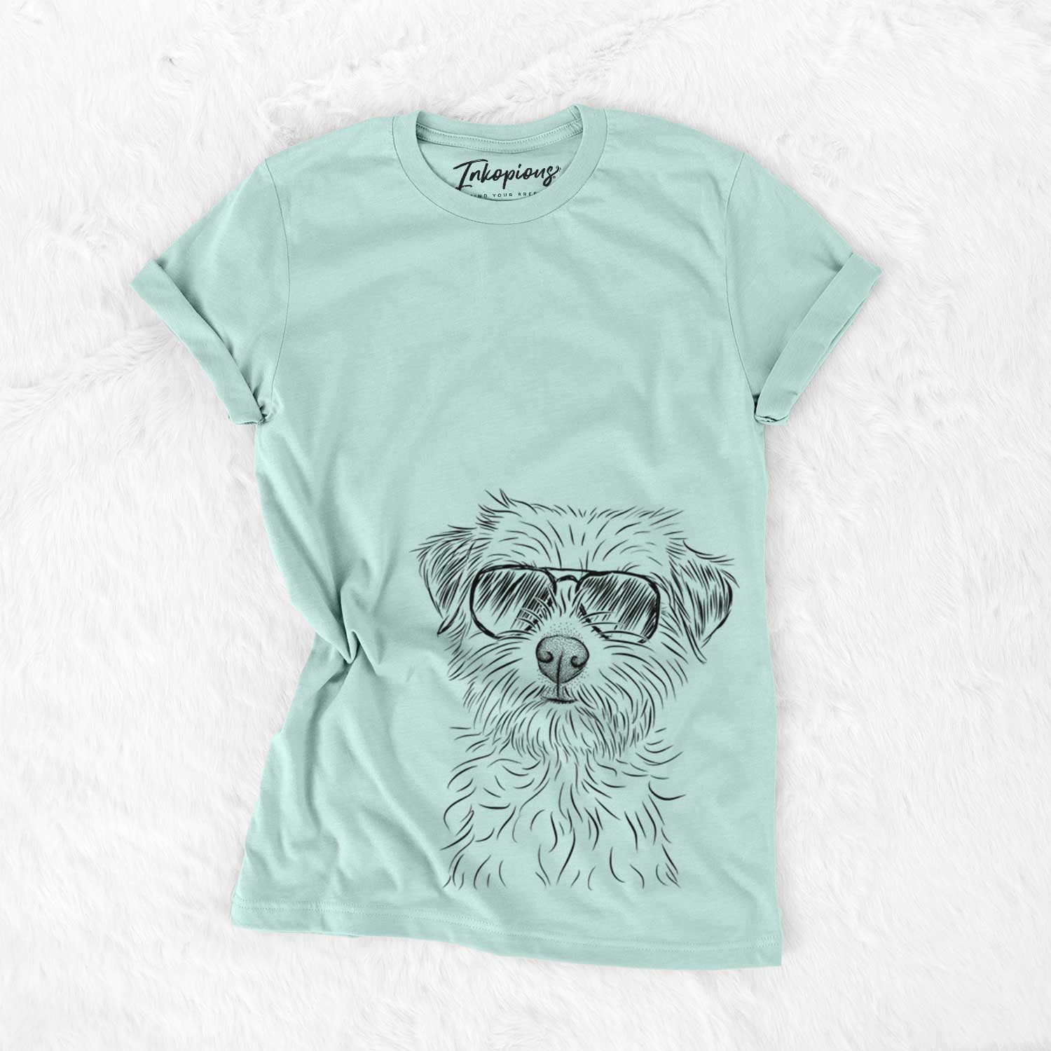 Hand-drawn sketch of Benjamin the Border Terrier wearing aviator sunglasses on a Heather Sage Unisex crewneck