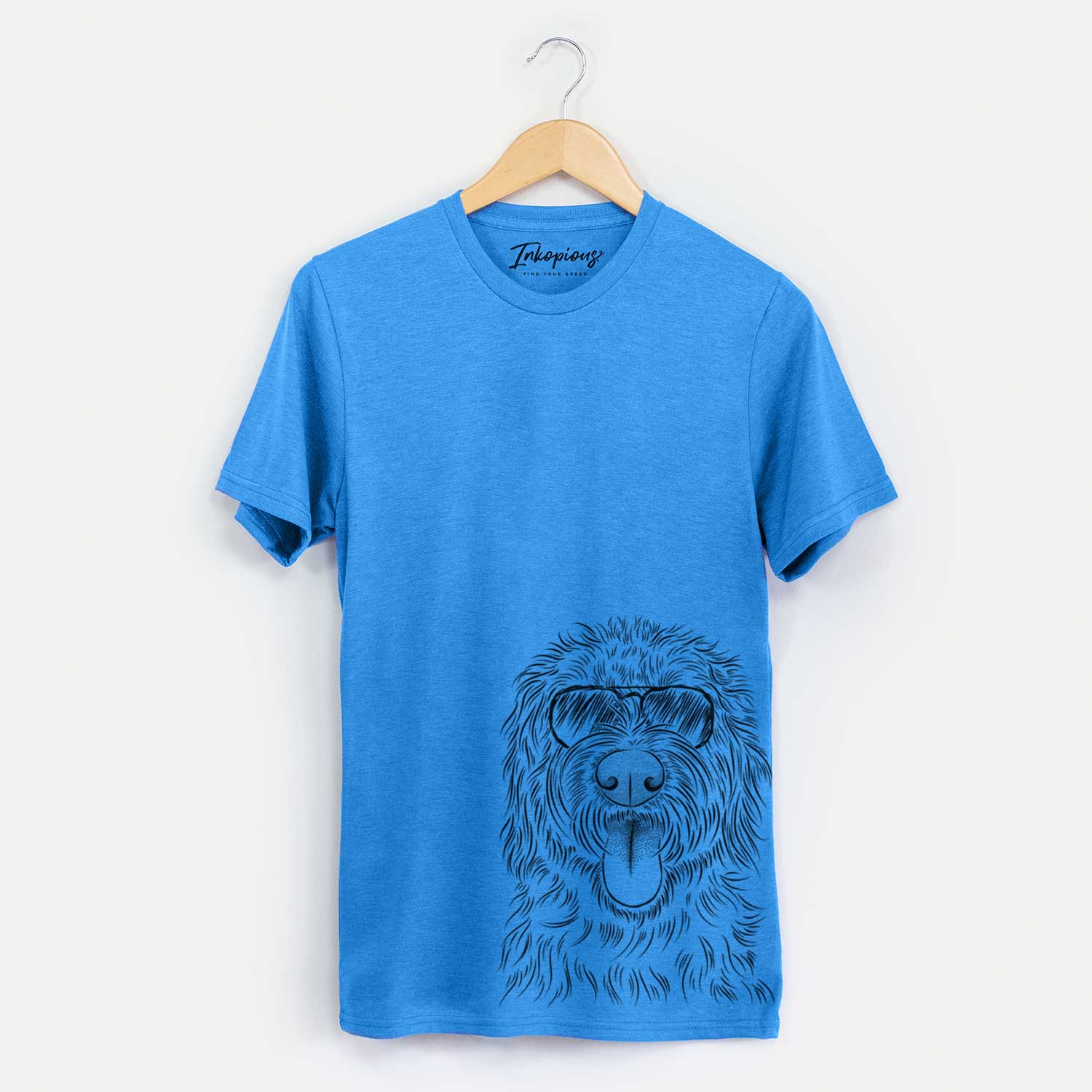Hand-drawn sketch of Bennett the Doodle wearing aviator sunglasses on a Blue Unisex crewneck