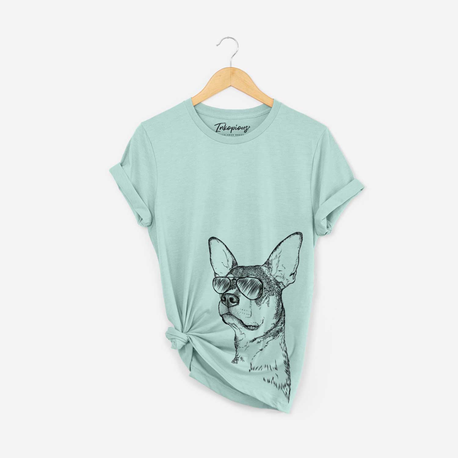 Hand-drawn sketch of Bill the Heeler Mix wearing aviator sunglasses on a Heather Sage Bella Canvas Unisex Crewneck