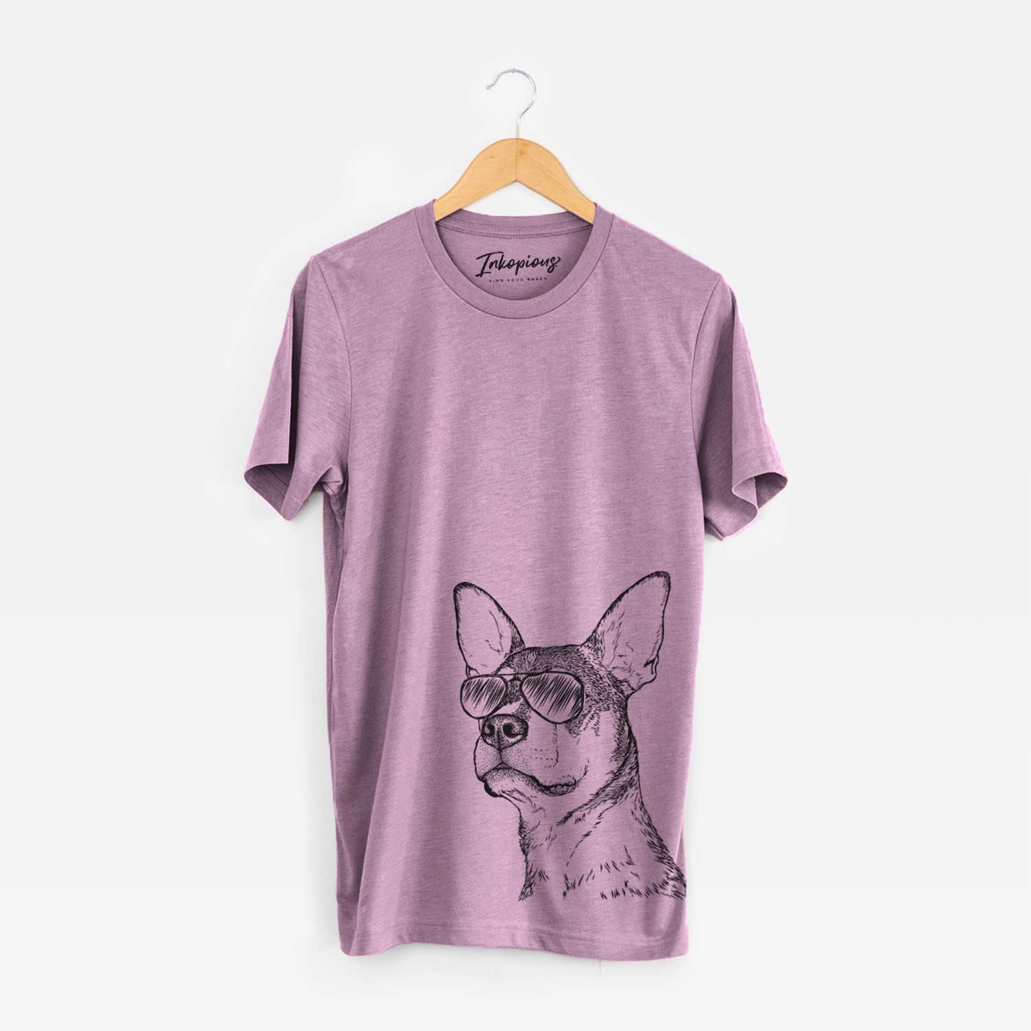 Hand-drawn sketch of Bill the Heeler Mix wearing aviator sunglasses on an Orchid Bella Canvas Unisex Crewneck