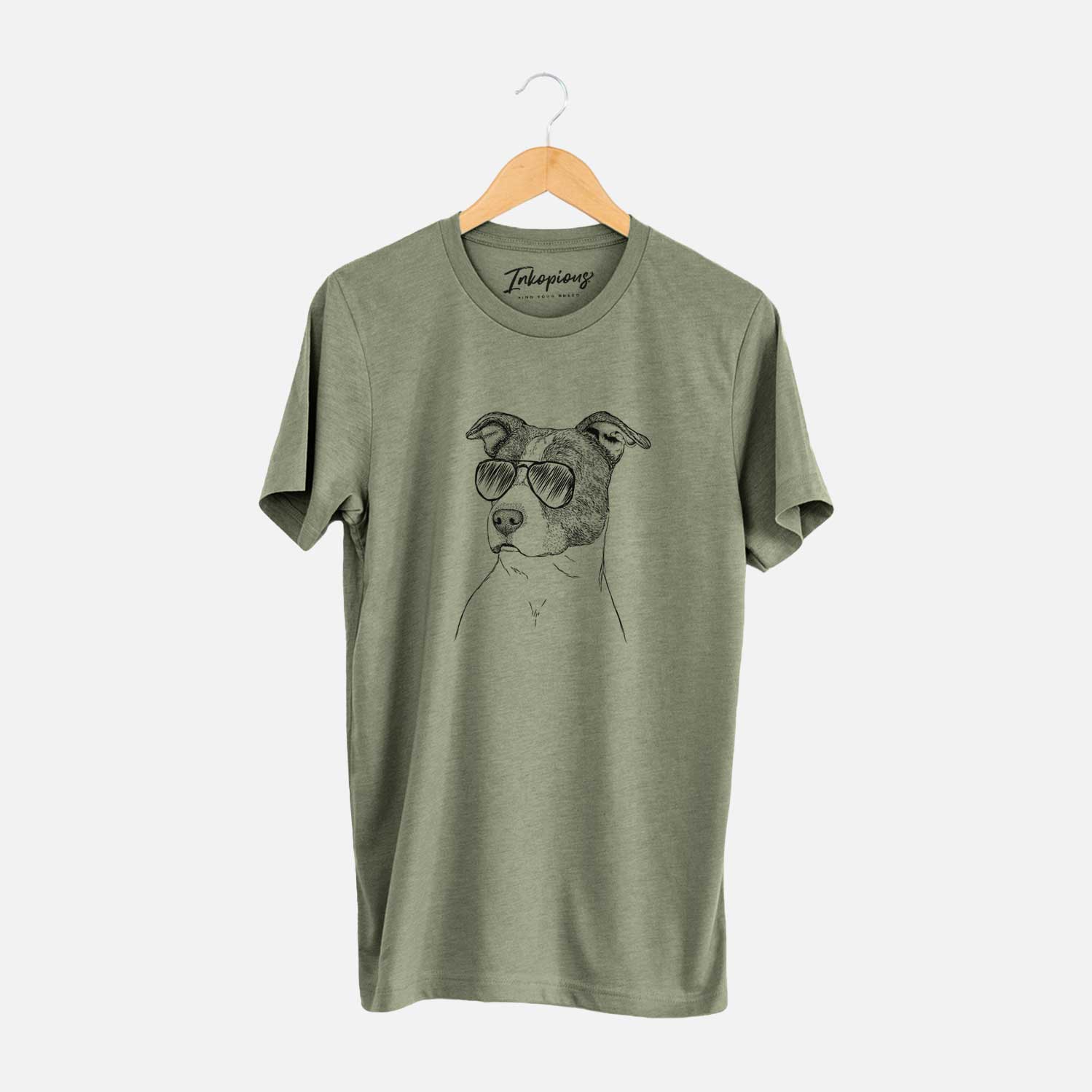 Hand-drawn sketch of Blu the Pitbull wearing aviator sunglasses on an Olive Unisex crewneck