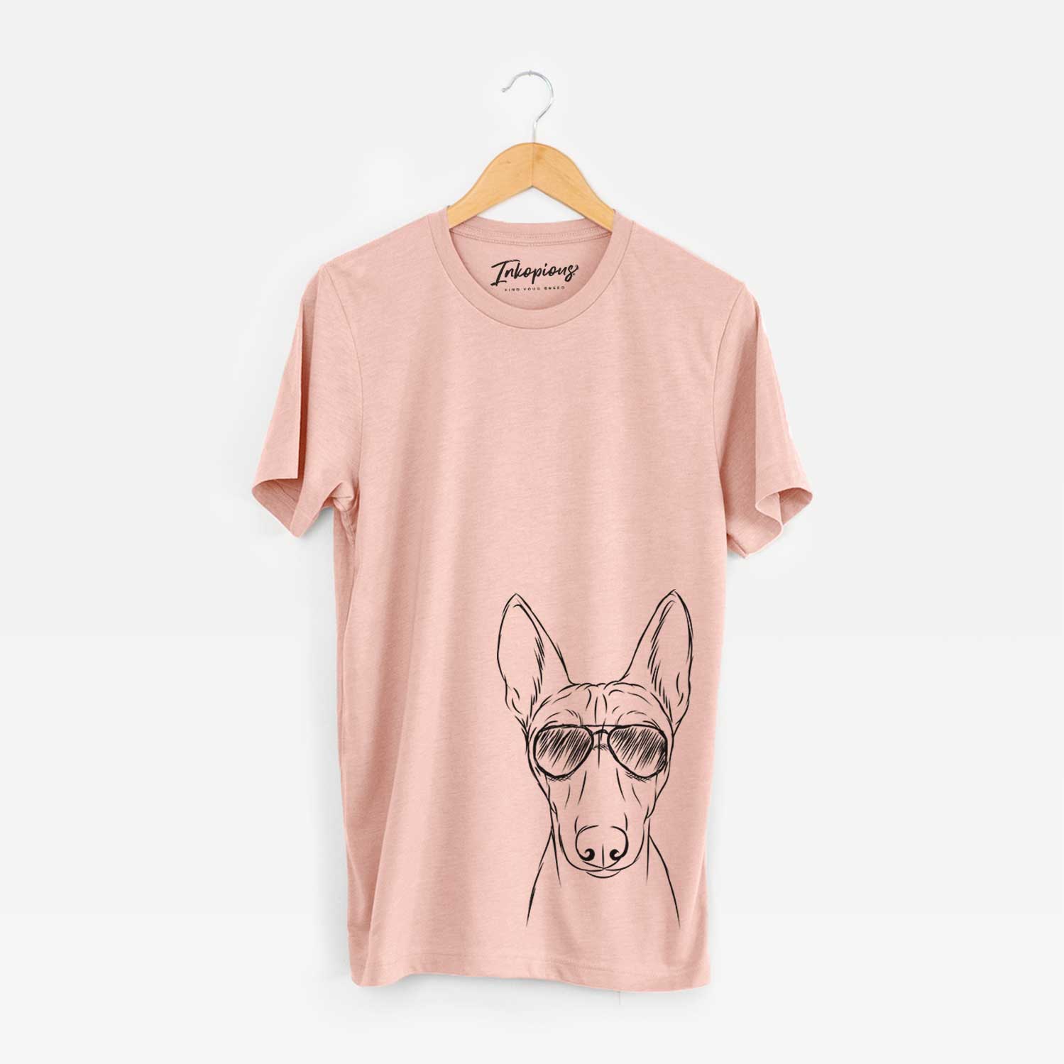 Hand-drawn sketch of Bonsai the Basenji wearing aviator sunglasses on a Peach Bella Canvas Unisex Crewneck
