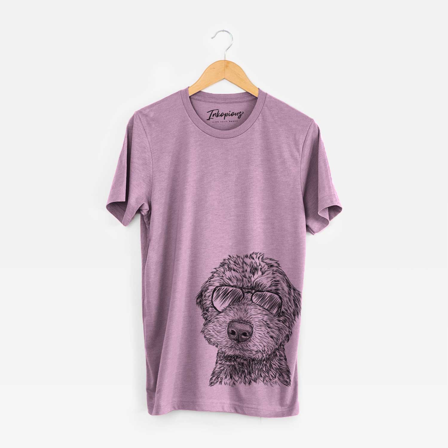 Hand-drawn sketch of Bowser the Whoodle wearing aviator sunglasses on an Orchid Unisex crewneck