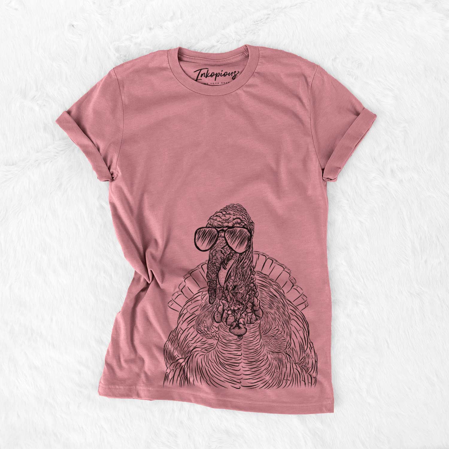 Hand-drawn sketch of Brady the Turkey wearing aviator sunglasses on a Mauve Bella Canvas Unisex Crewneck