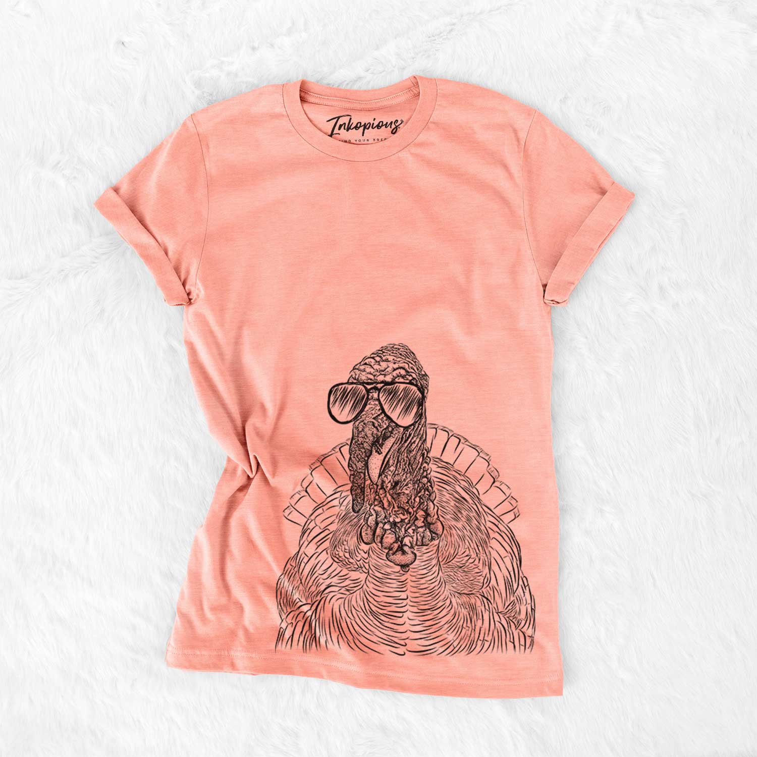 Hand-drawn sketch of Brady the Turkey wearing aviator sunglasses on a Sunset Bella Canvas Unisex Crewneck