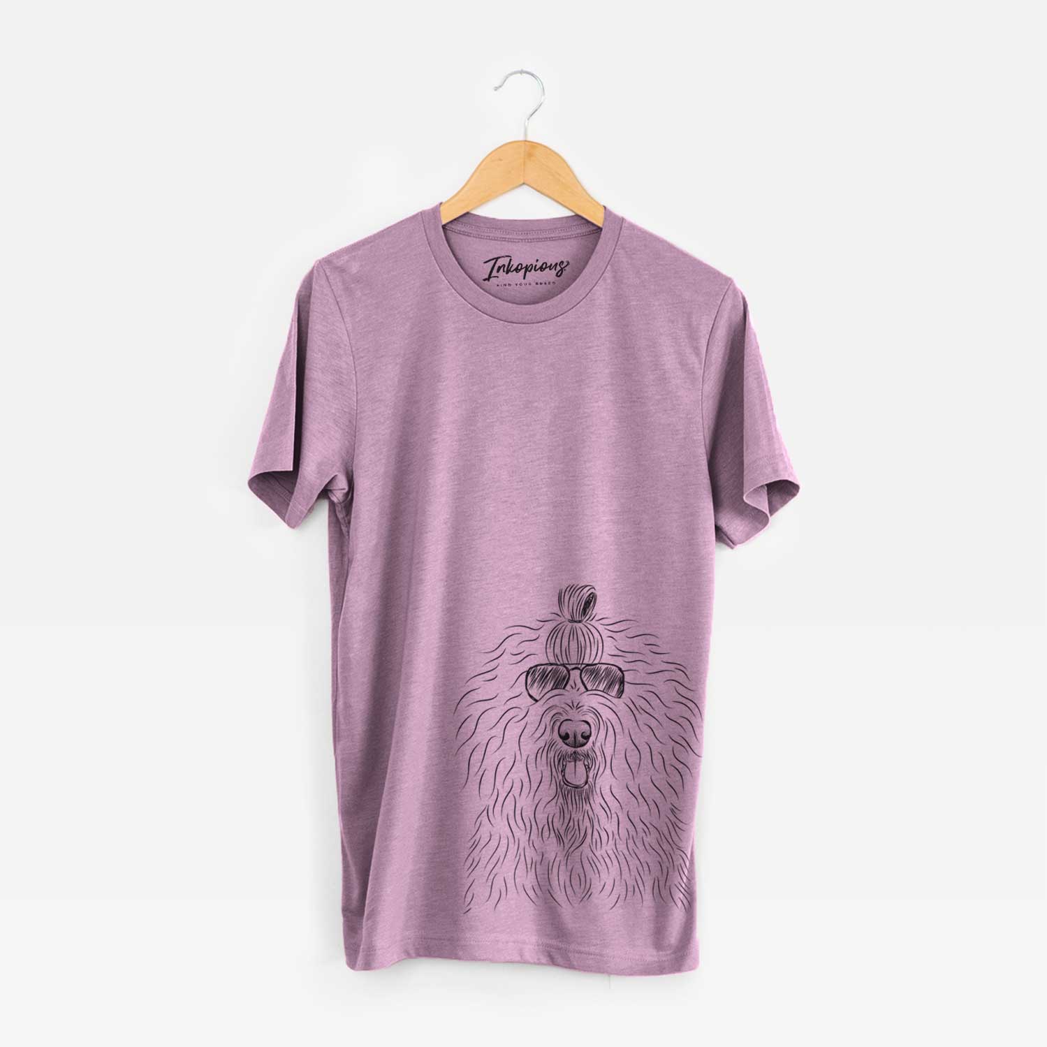 Hand-drawn sketch of Brody the Old English Sheepdog wearing aviator sunglasses on an Orchid Unisex crewneck