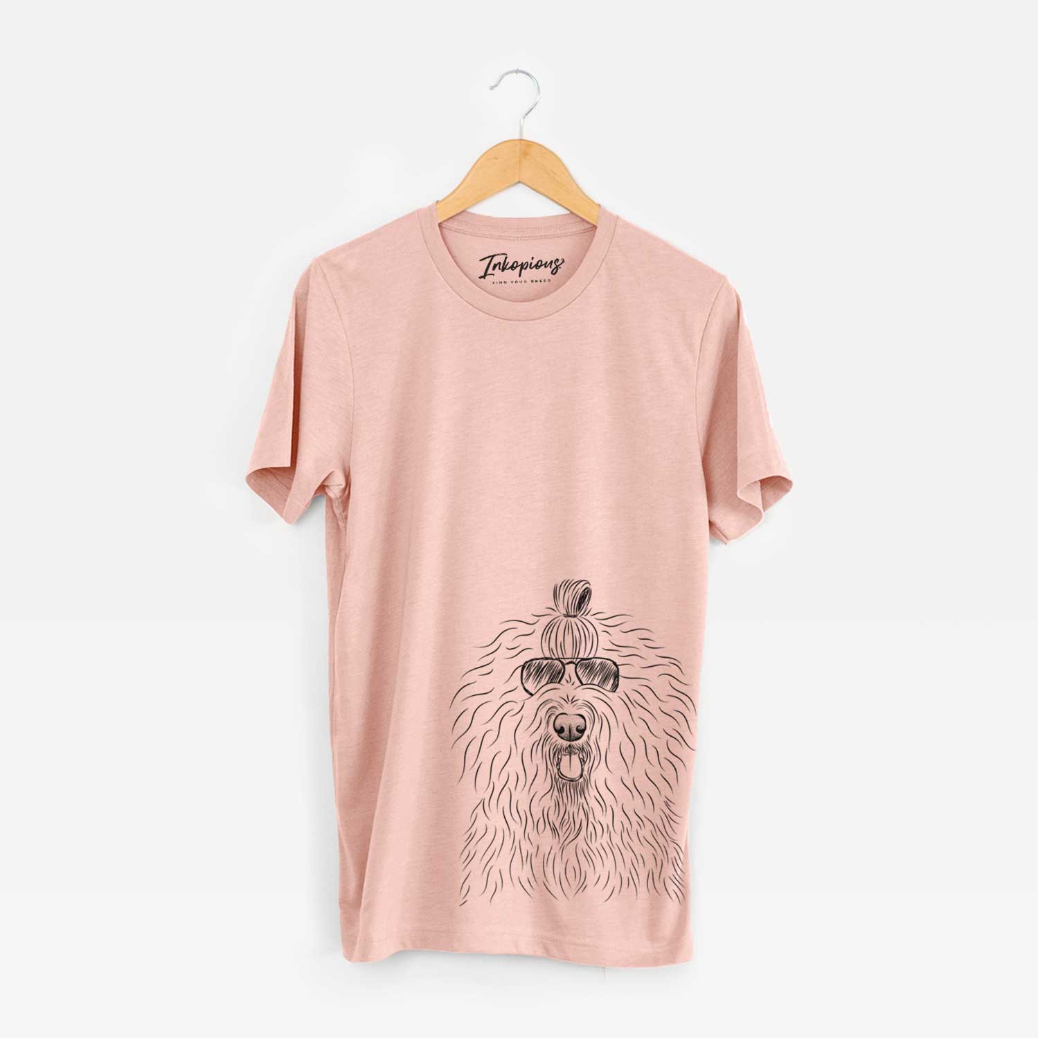 Hand-drawn sketch of Brody the Old English Sheepdog wearing aviator sunglasses on a Peach Unisex crewneck