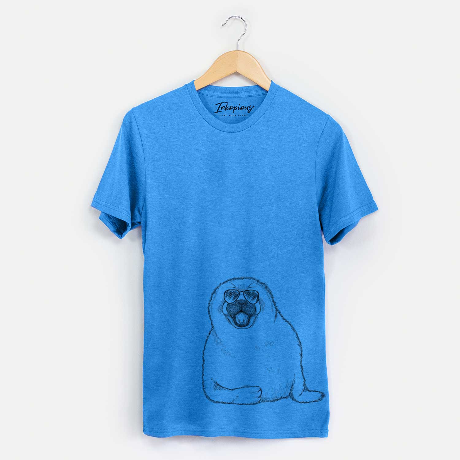 Hand-drawn sketch of Bub the Harp Seal wearing aviator sunglasses on a Blue Unisex crewneck