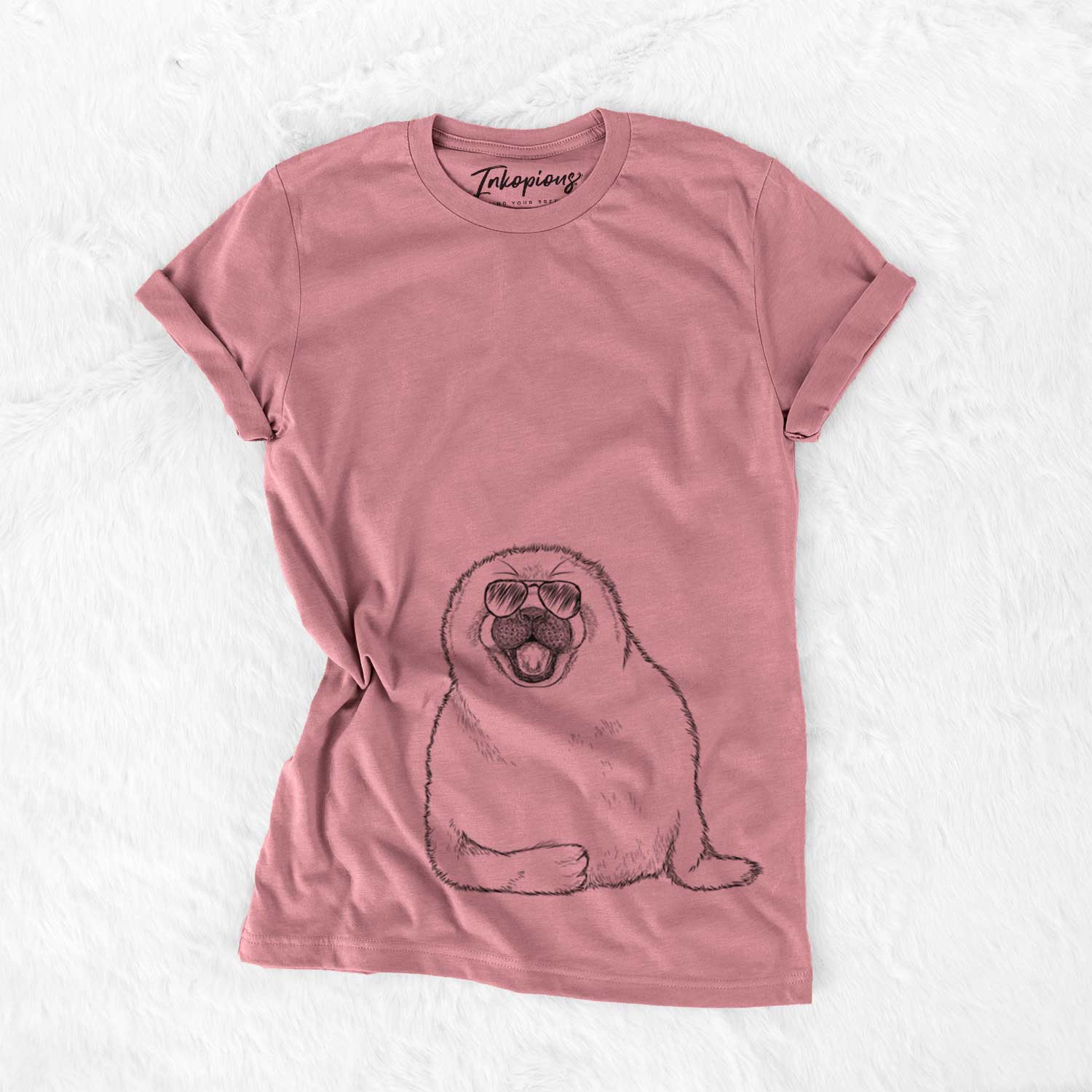 Hand-drawn sketch of Bub the Harp Seal wearing aviator sunglasses on a Mauve Unisex crewneck
