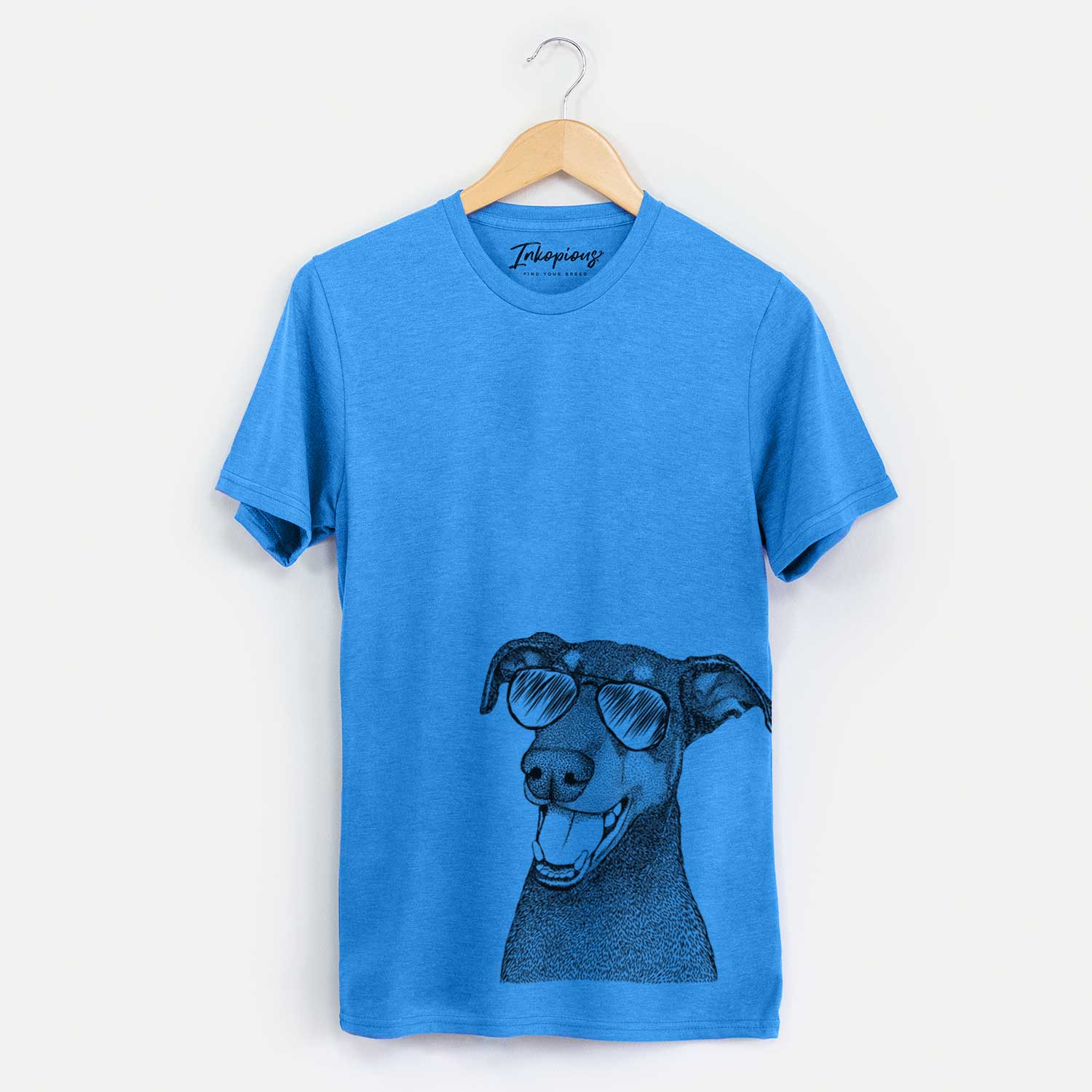 Hand-drawn sketch of Bunnie the Doberman Pinscher wearing aviator sunglasses on a Blue Unisex crewneck