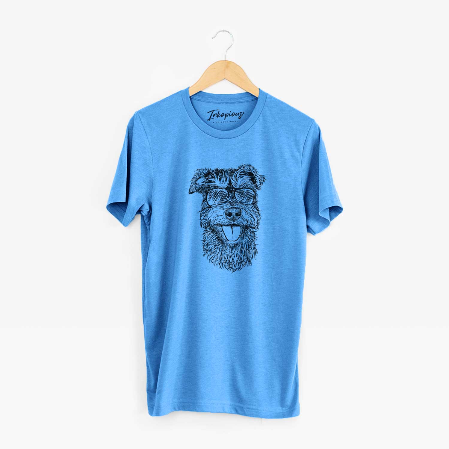Hand-drawn sketch of Buster the Schnoodle wearing aviator sunglasses on a Blue Unisex crewneck