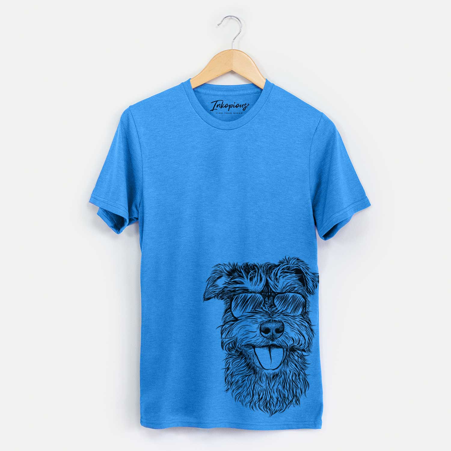 Hand-drawn sketch of Buster the Schnoodle wearing aviator sunglasses on a Blue Unisex crewneck