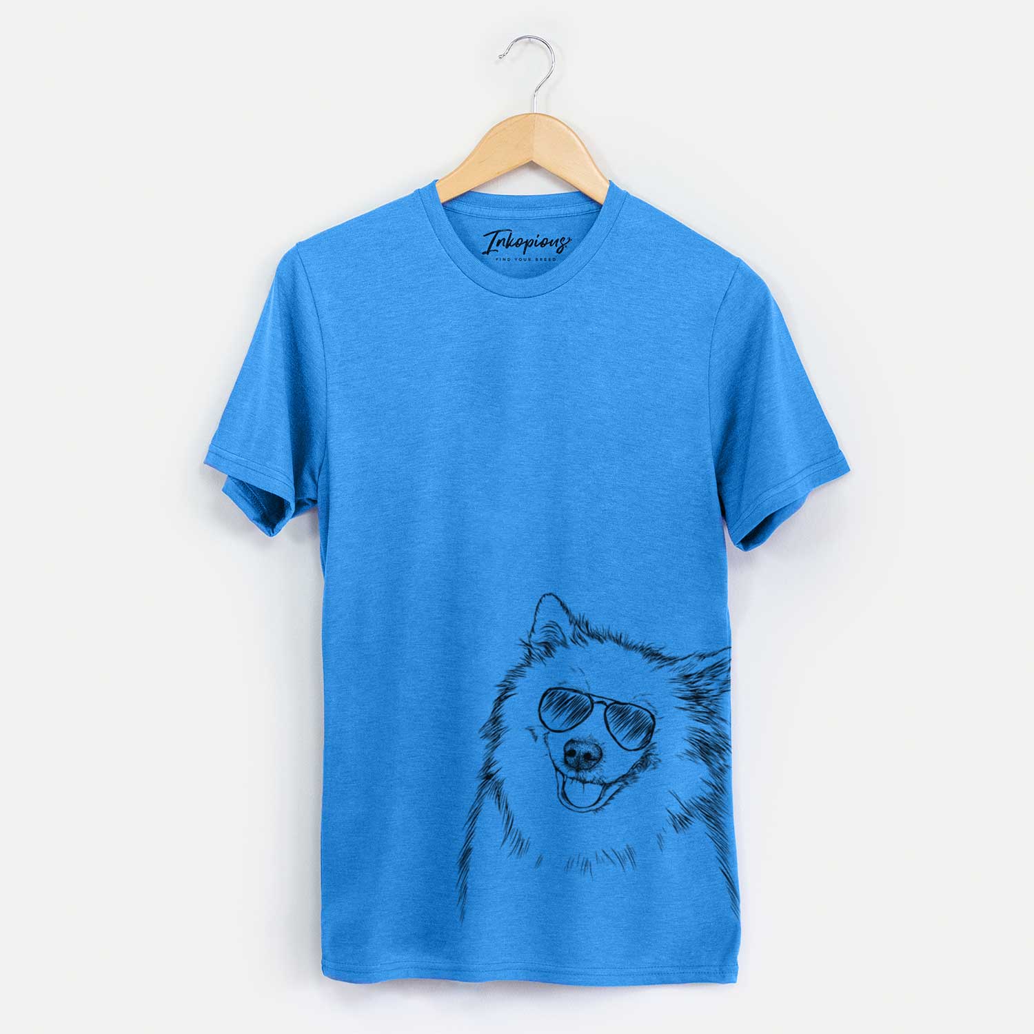 Hand-drawn sketch of Caico the Samoyed wearing aviator sunglasses on a Blue Unisex crewneck