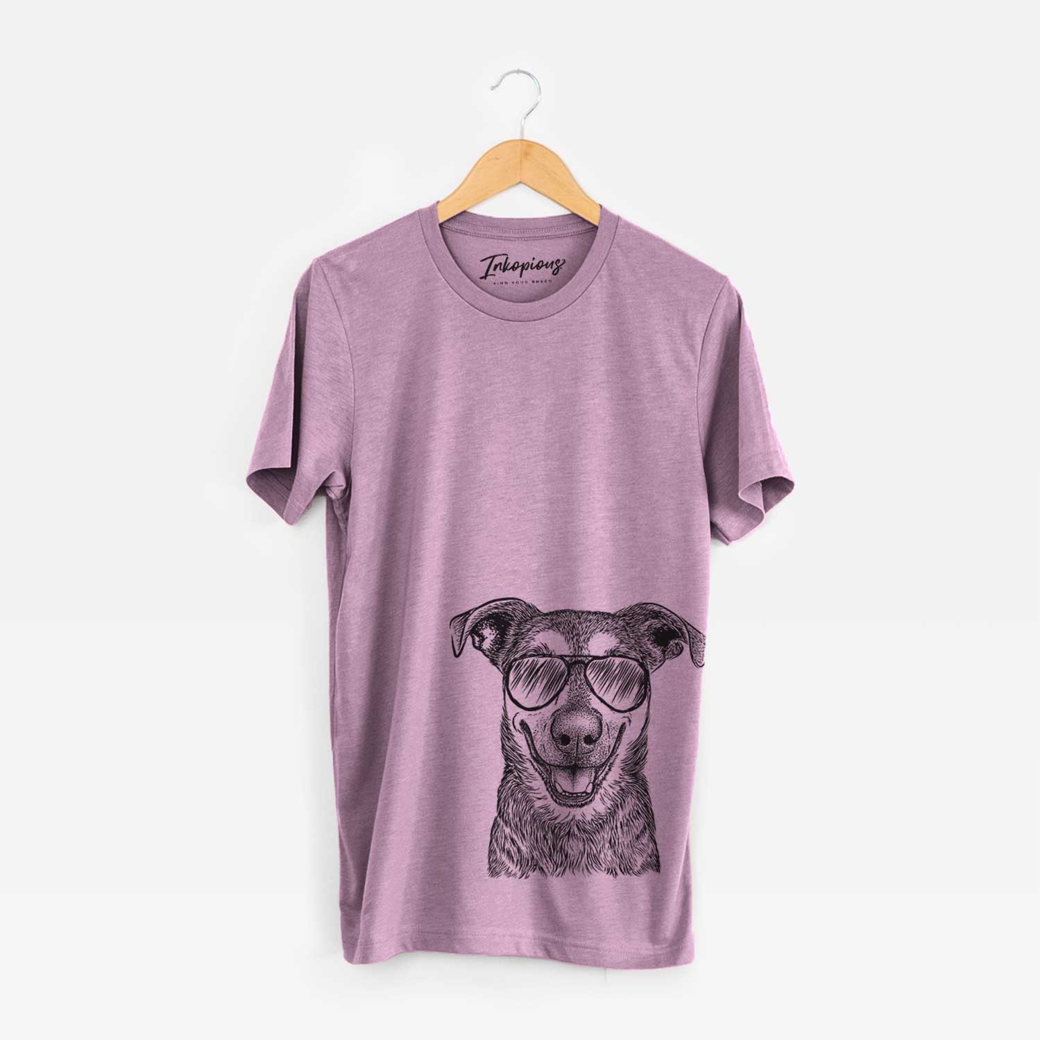 Hand-drawn sketch of Case the Mixed Breed wearing aviator sunglasses on an Orchid Unisex crewneck