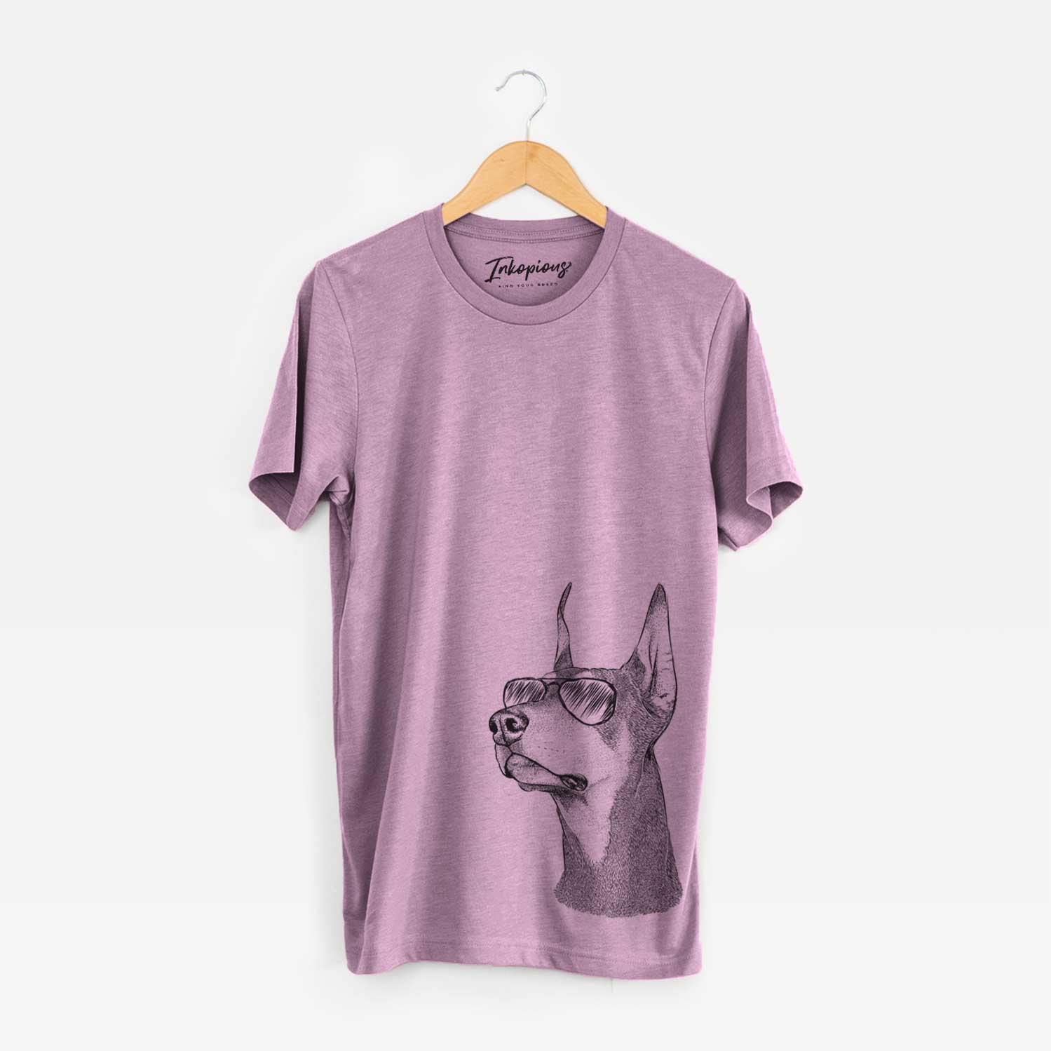 Hand-drawn sketch of Cenza the Doberman Pinscher wearing aviator sunglasses on an Orchid Bella Canvas Unisex Crewneck