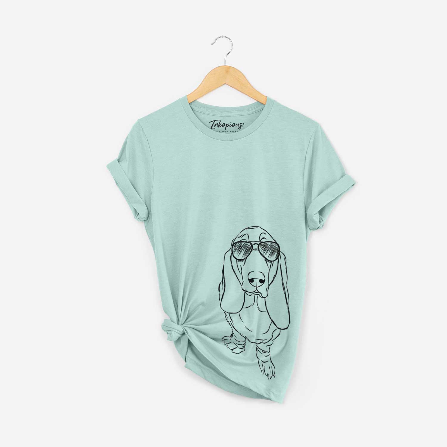 Hand-drawn sketch of Charlie the Basset Hound wearing aviator sunglasses on a Heather Sage Bella Canvas Unisex Crewneck