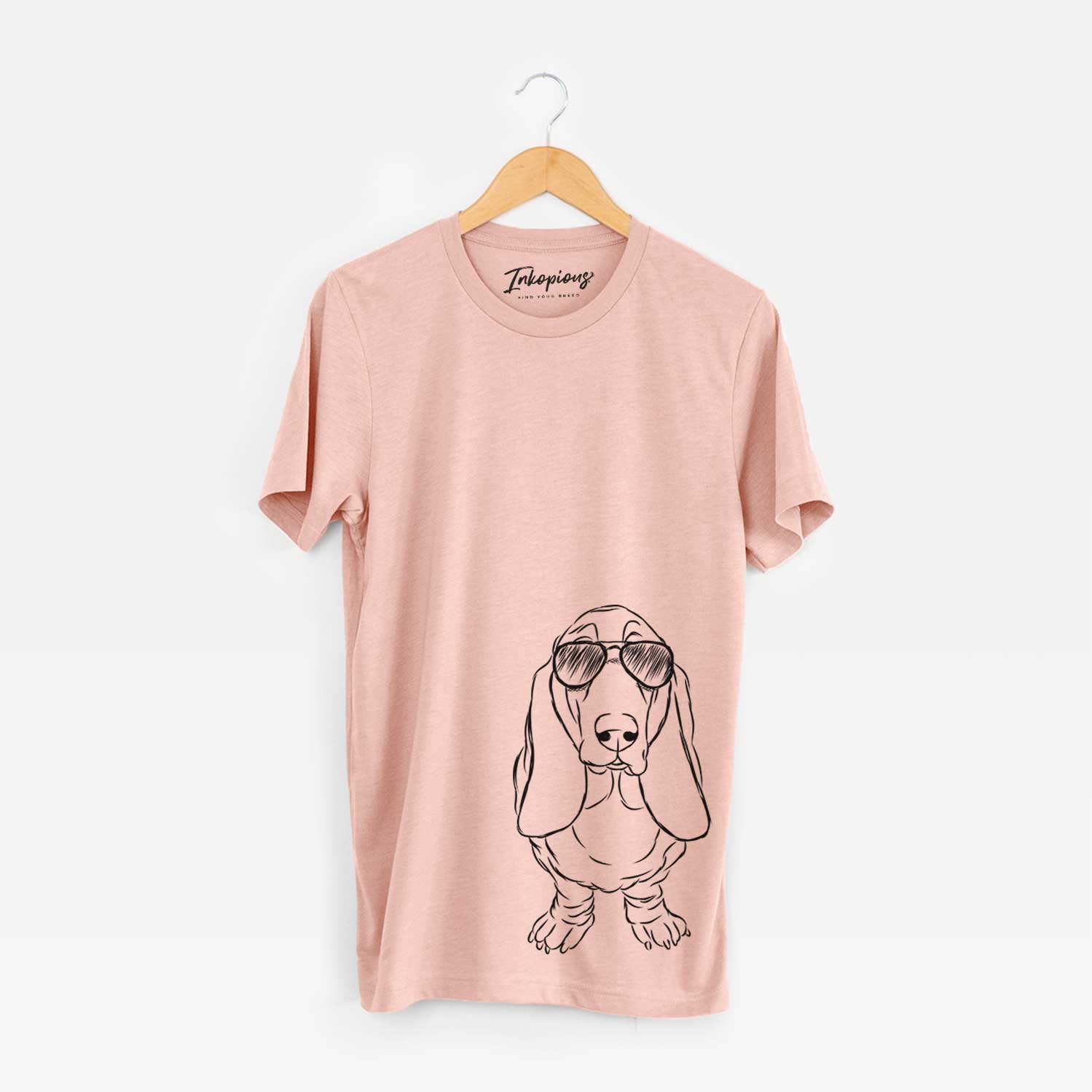 Hand-drawn sketch of Charlie the Basset Hound wearing aviator sunglasses on a Peach Bella Canvas Unisex Crewneck