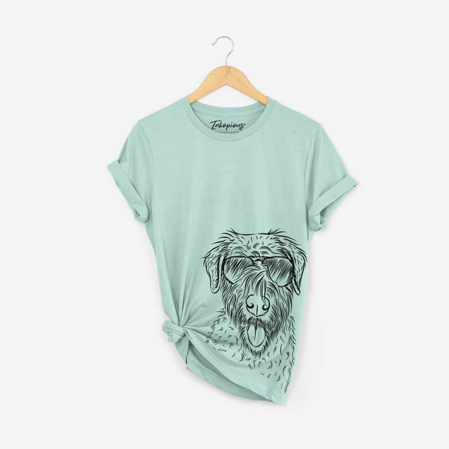 Hand-drawn sketch of Chester the Soft Coated Wheaten Terrier wearing aviator sunglasses on a Heather Sage Bella Canvas Unisex Crewneck