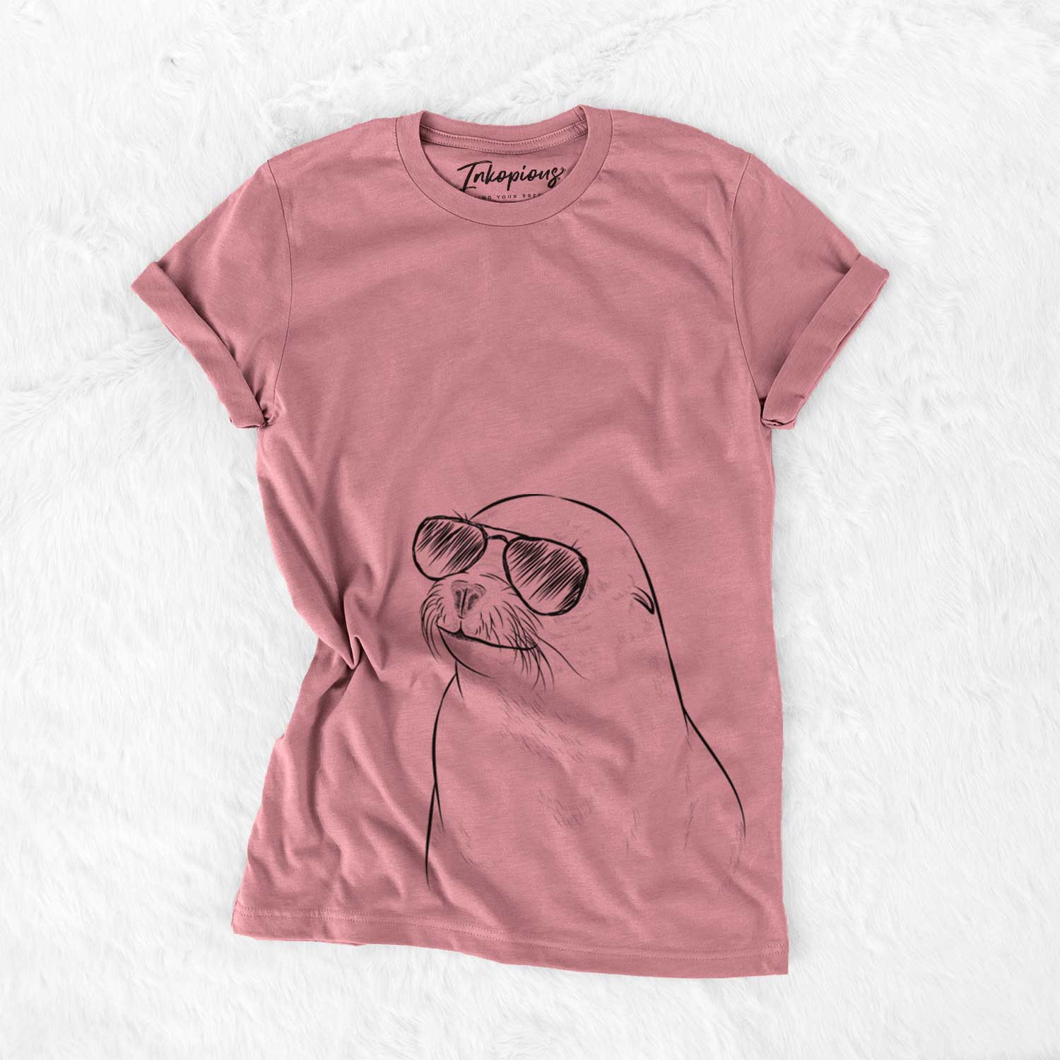 Hand-drawn sketch of Chip the California Sea Lion wearing aviator sunglasses on a Mauve Unisex crewneck