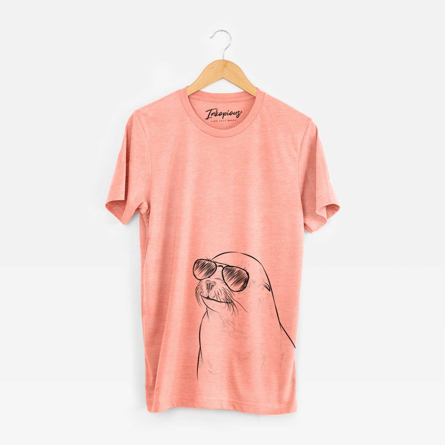 Hand-drawn sketch of Chip the California Sea Lion wearing aviator sunglasses on a Sunset Unisex crewneck