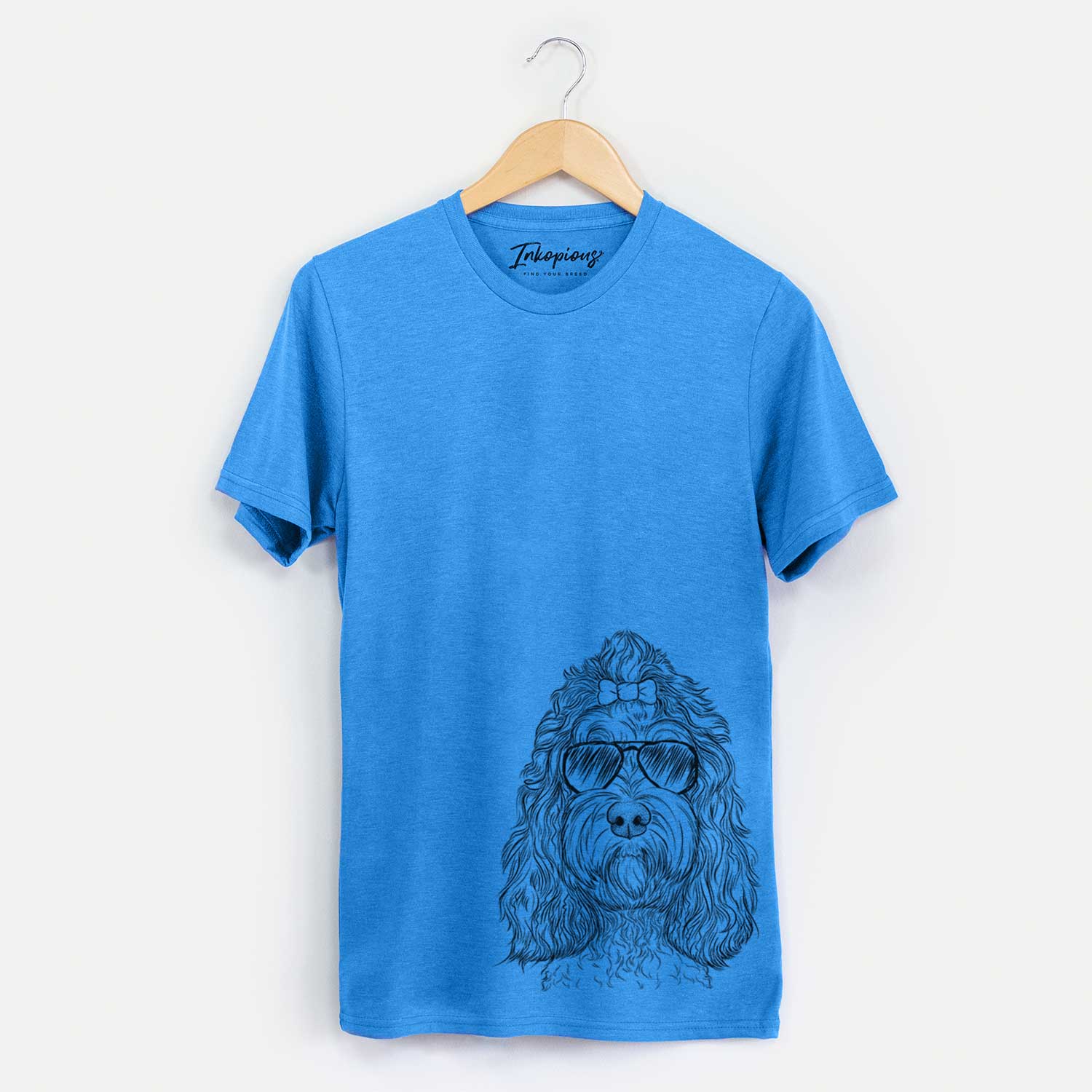 Hand-drawn sketch of Chloe the Cockapoo wearing aviator sunglasses on a Blue Unisex crewneck