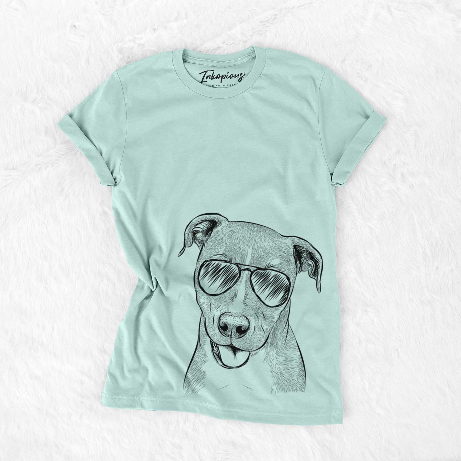 Hand-drawn sketch of Claiborne the American Staffordshire Terrier wearing aviator sunglasses on a Heather Sage Unisex crewneck