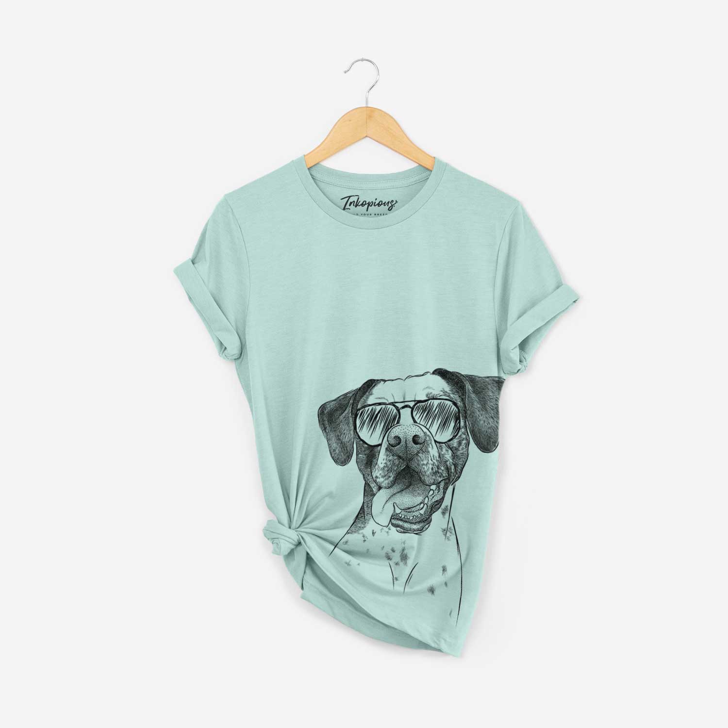 Hand-drawn sketch of Cola the Catahoula wearing aviator sunglasses on a Heather Sage Bella Canvas Unisex Crewneck