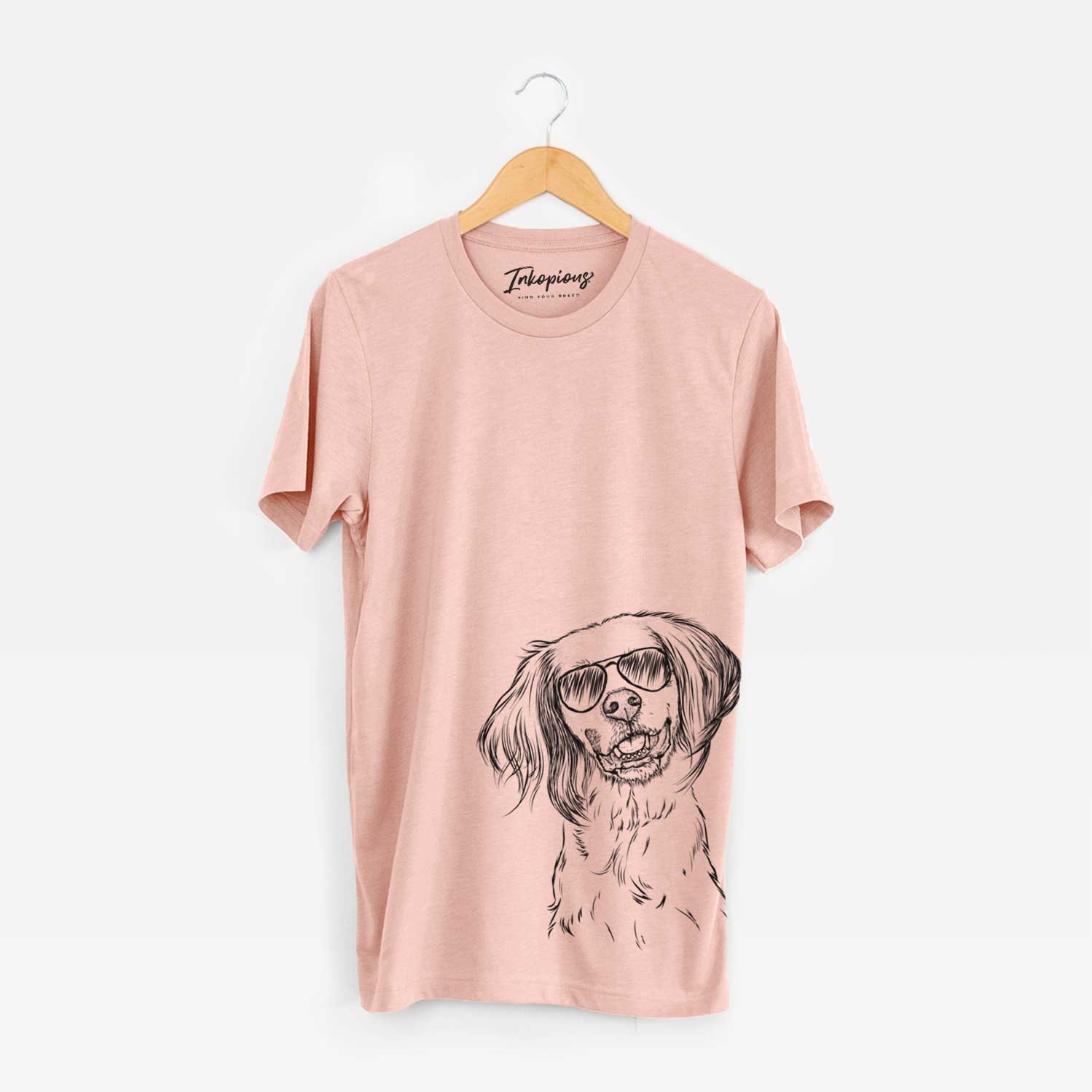 Hand-drawn sketch of Cooper the English Setter wearing aviator sunglasses on a Peach Bella Canvas Unisex Crewneck