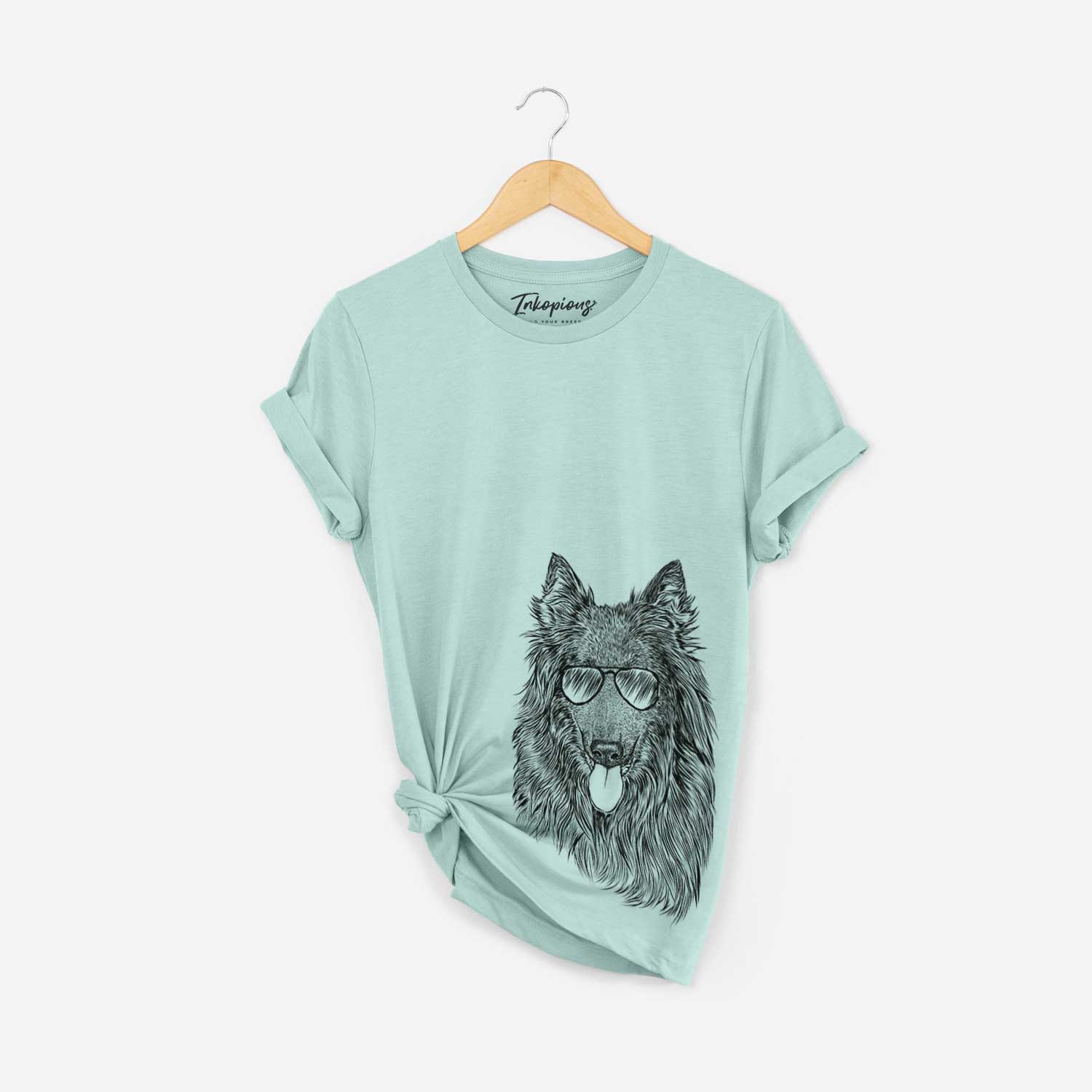 Hand-drawn sketch of Daan the Belgian Shepherd wearing aviator sunglasses on a Heather Sage Bella Canvas Unisex Crewneck