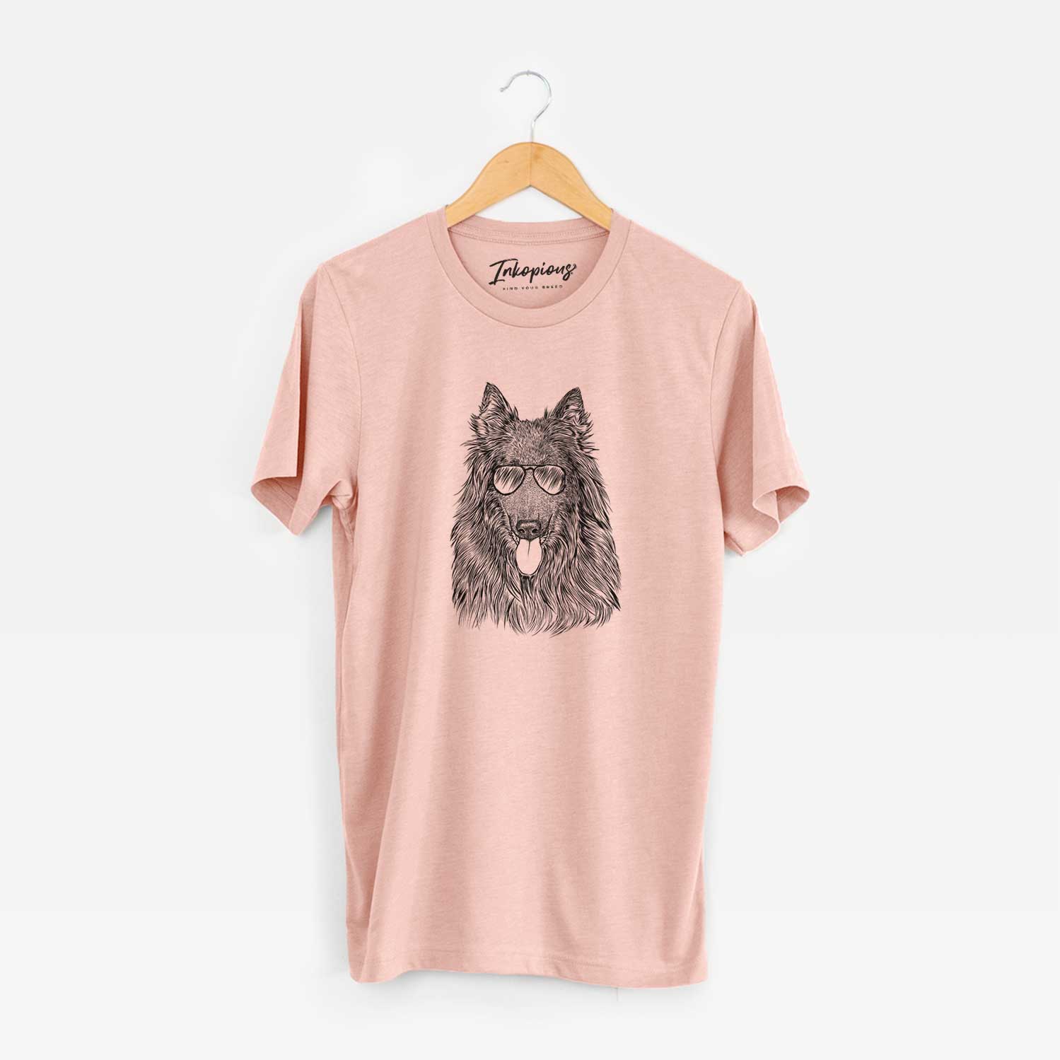 Hand-drawn sketch of Daan the Belgian Shepherd wearing aviator sunglasses on a Peach Unisex crewneck