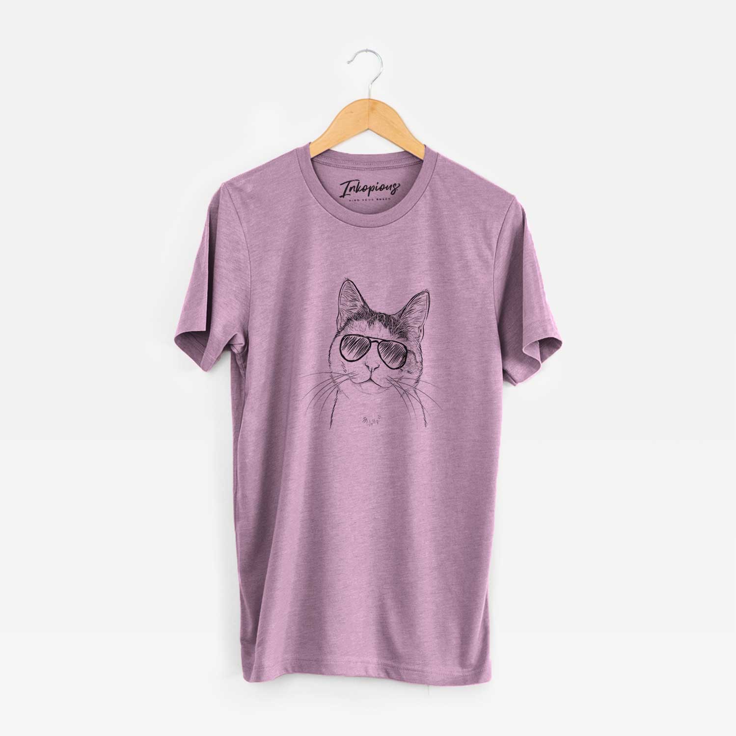 Hand-drawn sketch of Denver the Calico Cat wearing aviator sunglasses on an Orchid Unisex crewneck