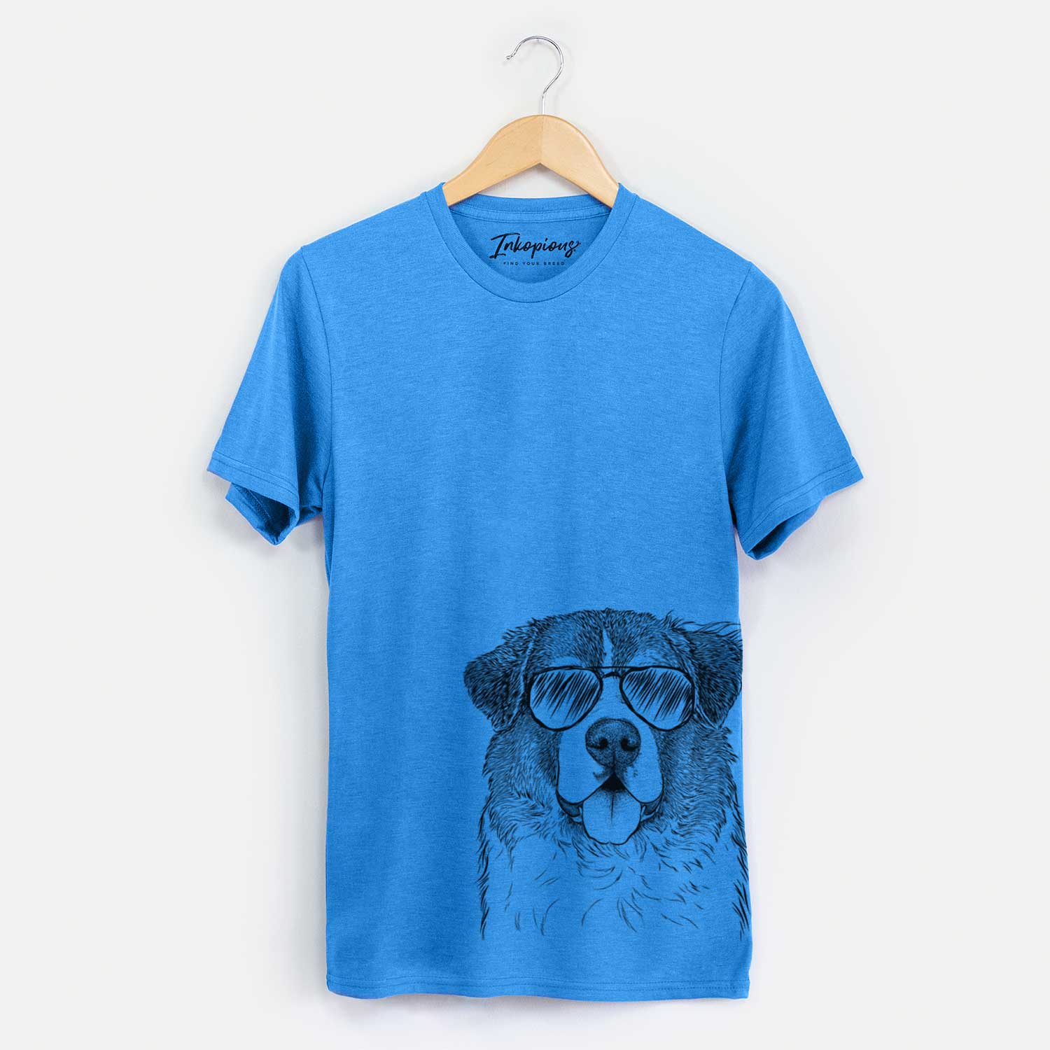 Hand-drawn sketch of Dilly the Saint Bernard wearing aviator sunglasses on a Blue Unisex crewneck