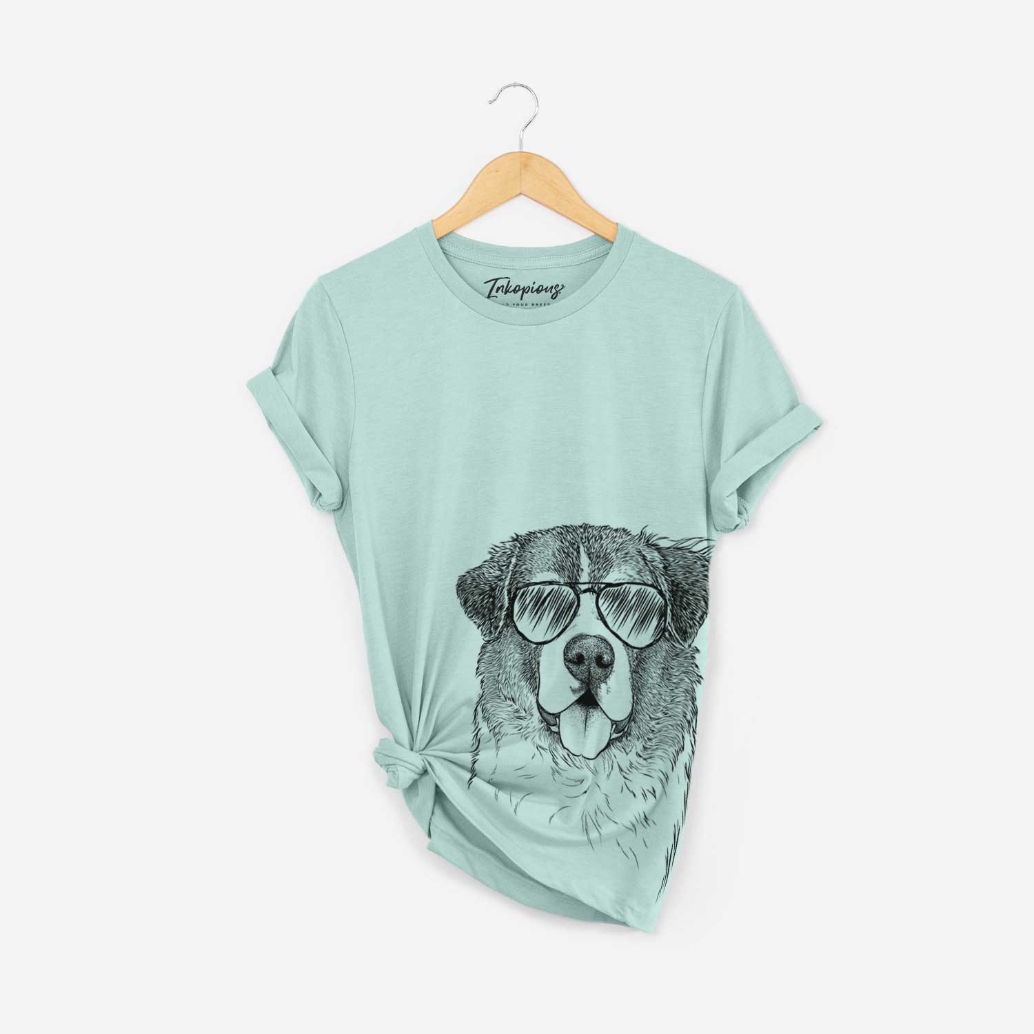 Hand-drawn sketch of Dilly the Saint Bernard wearing aviator sunglasses on a Heather Sage Bella Canvas Unisex Crewneck