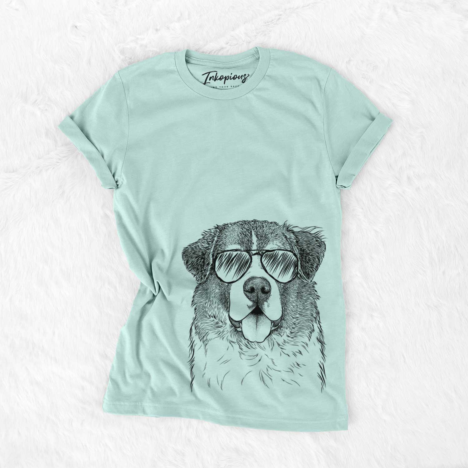 Hand-drawn sketch of Dilly the Saint Bernard wearing aviator sunglasses on a Heather Sage Unisex crewneck