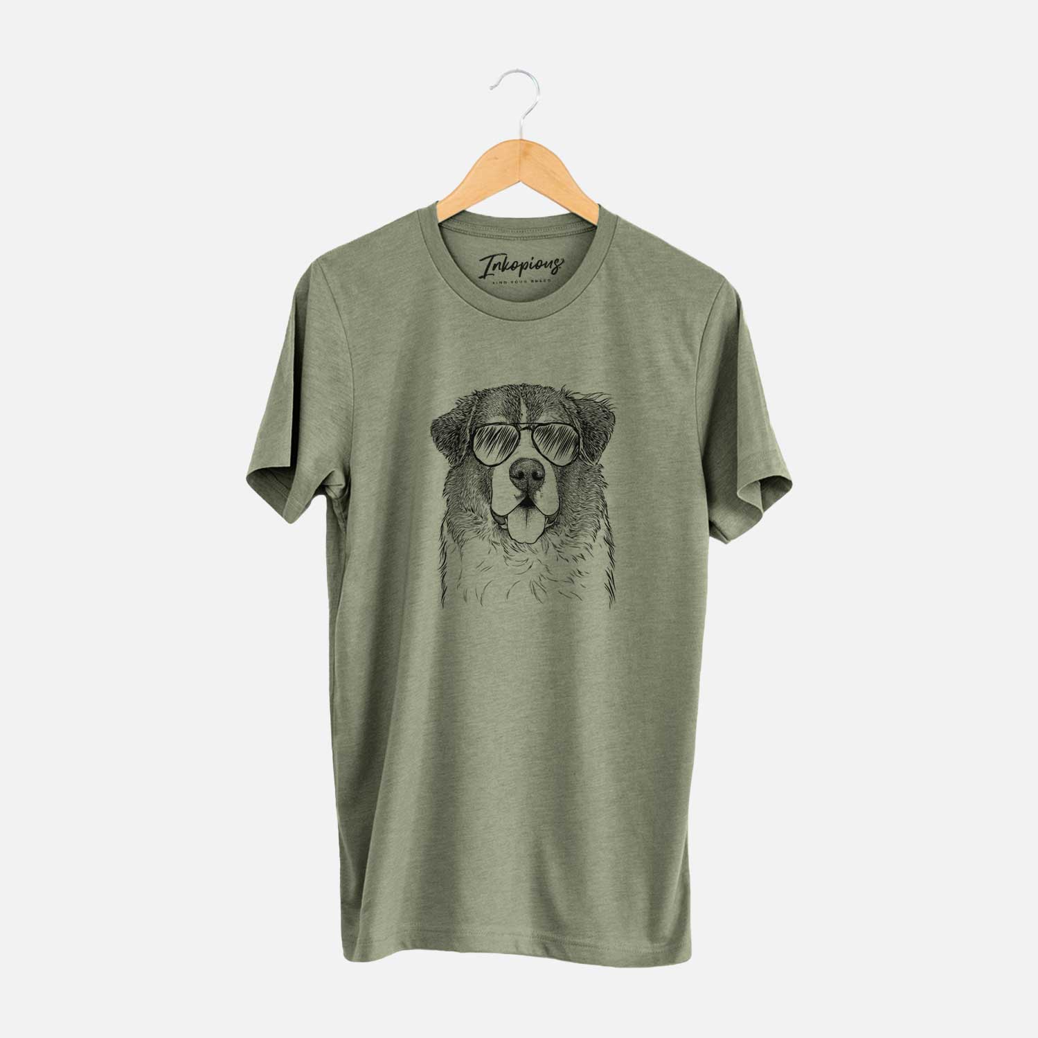 Hand-drawn sketch of Dilly the Saint Bernard wearing aviator sunglasses on an Olive Unisex crewneck