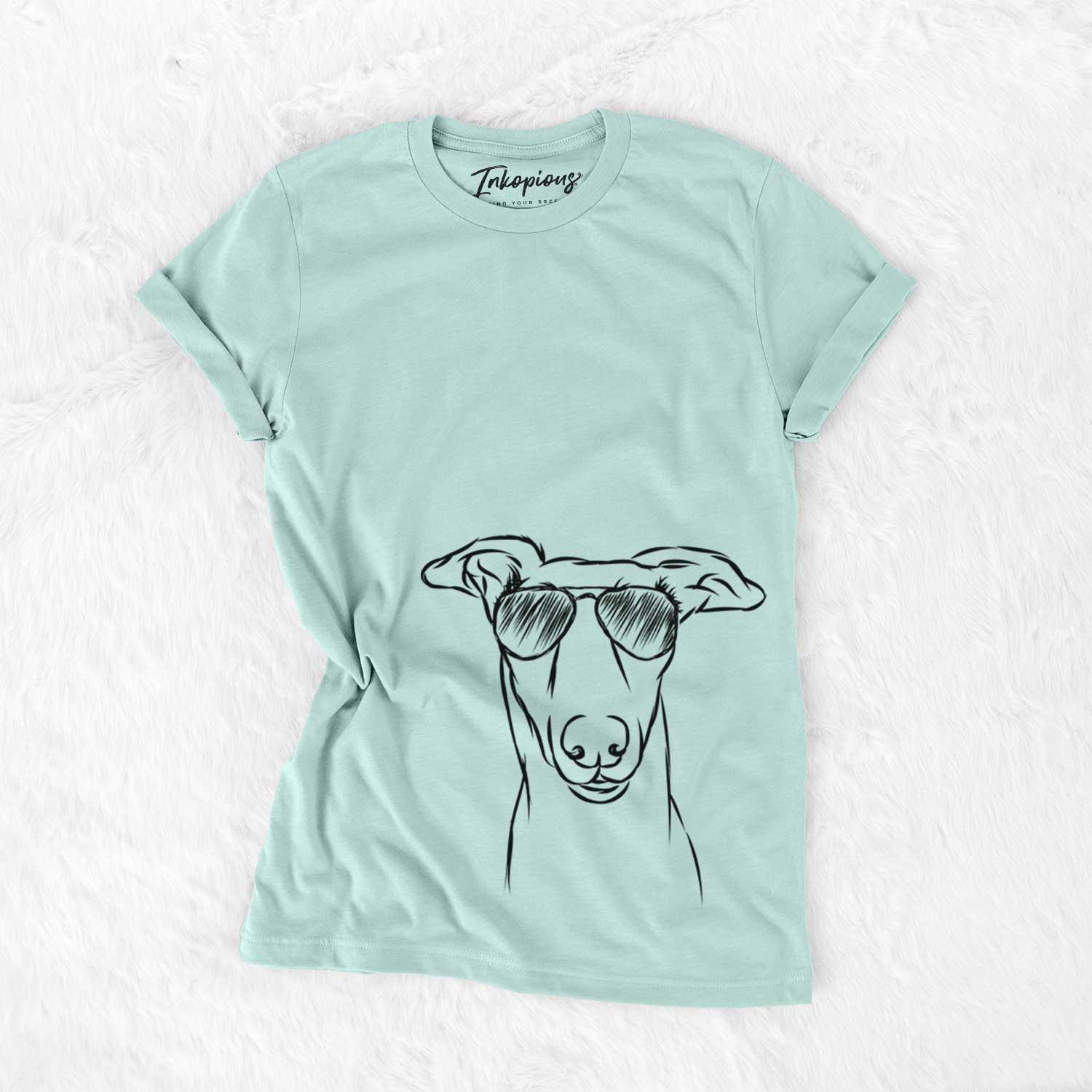 Hand-drawn sketch of Diva the Greyhound wearing aviator sunglasses on a Heather Sage Unisex crewneck
