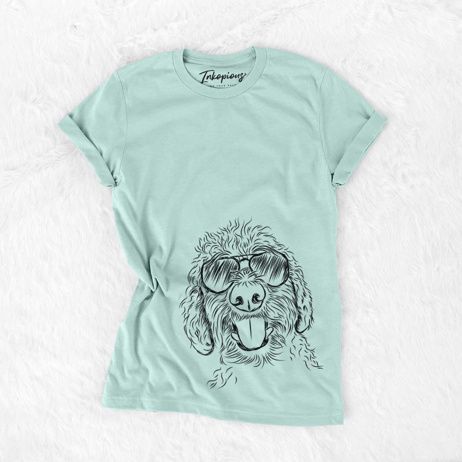 Hand-drawn sketch of Dixie the Doodle wearing aviator sunglasses on a Heather Sage Unisex crewneck