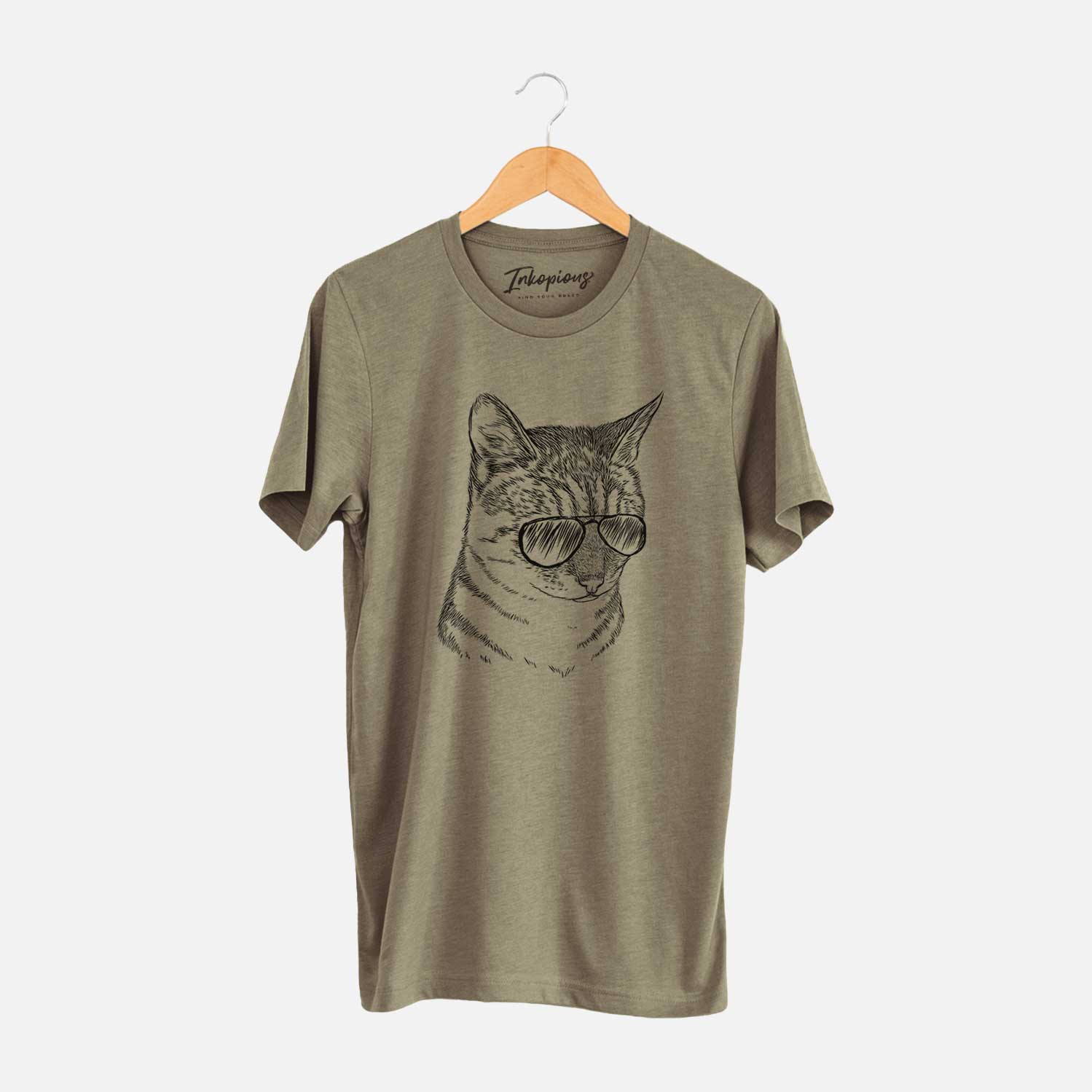 Hand-drawn sketch of Dora the Tabby Cat wearing aviator sunglasses on an Olive Unisex crewneck
