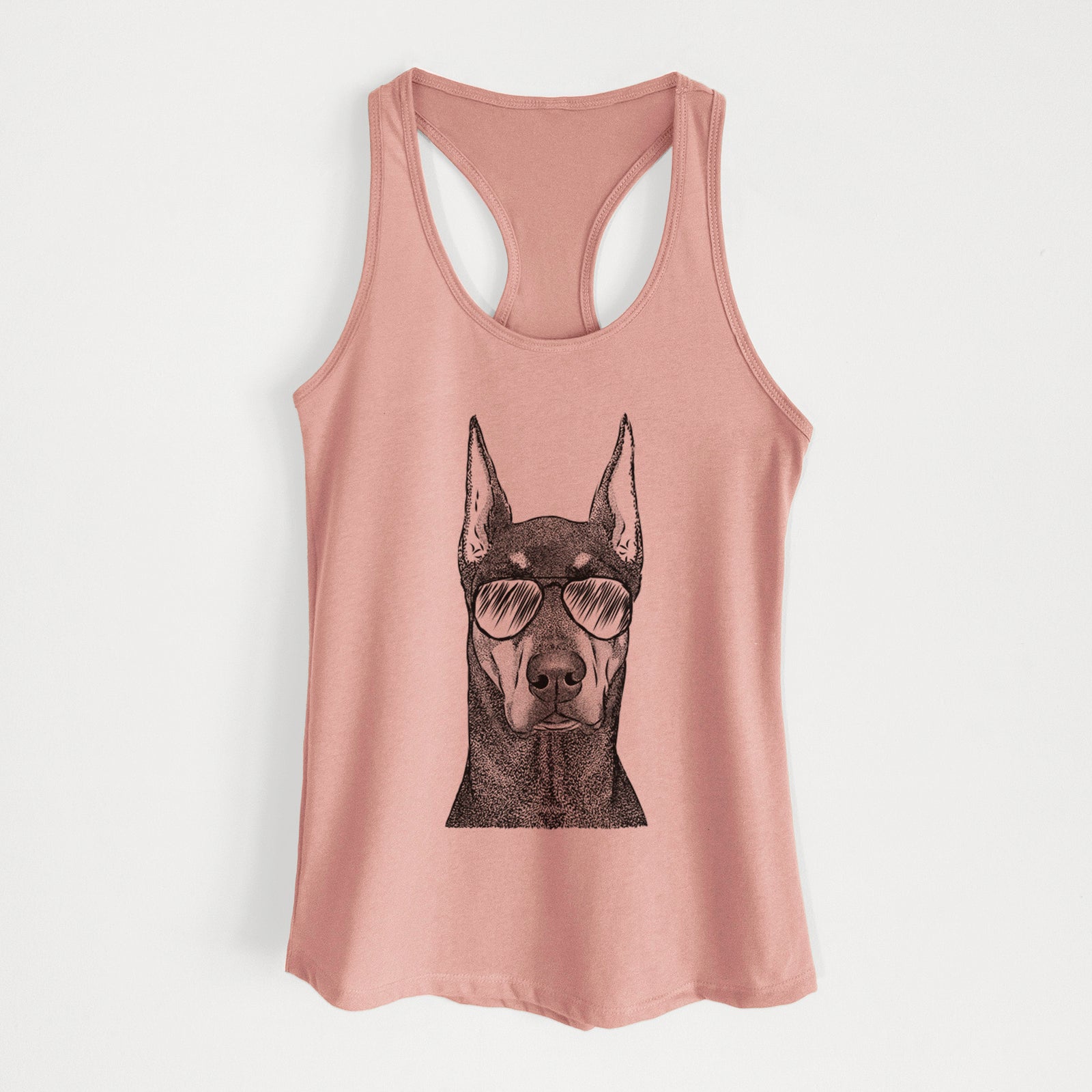 Hand-drawn sketch of Drake the Doberman Pinscher wearing aviator sunglasses on a Desert Pink Women's racerback tanktop