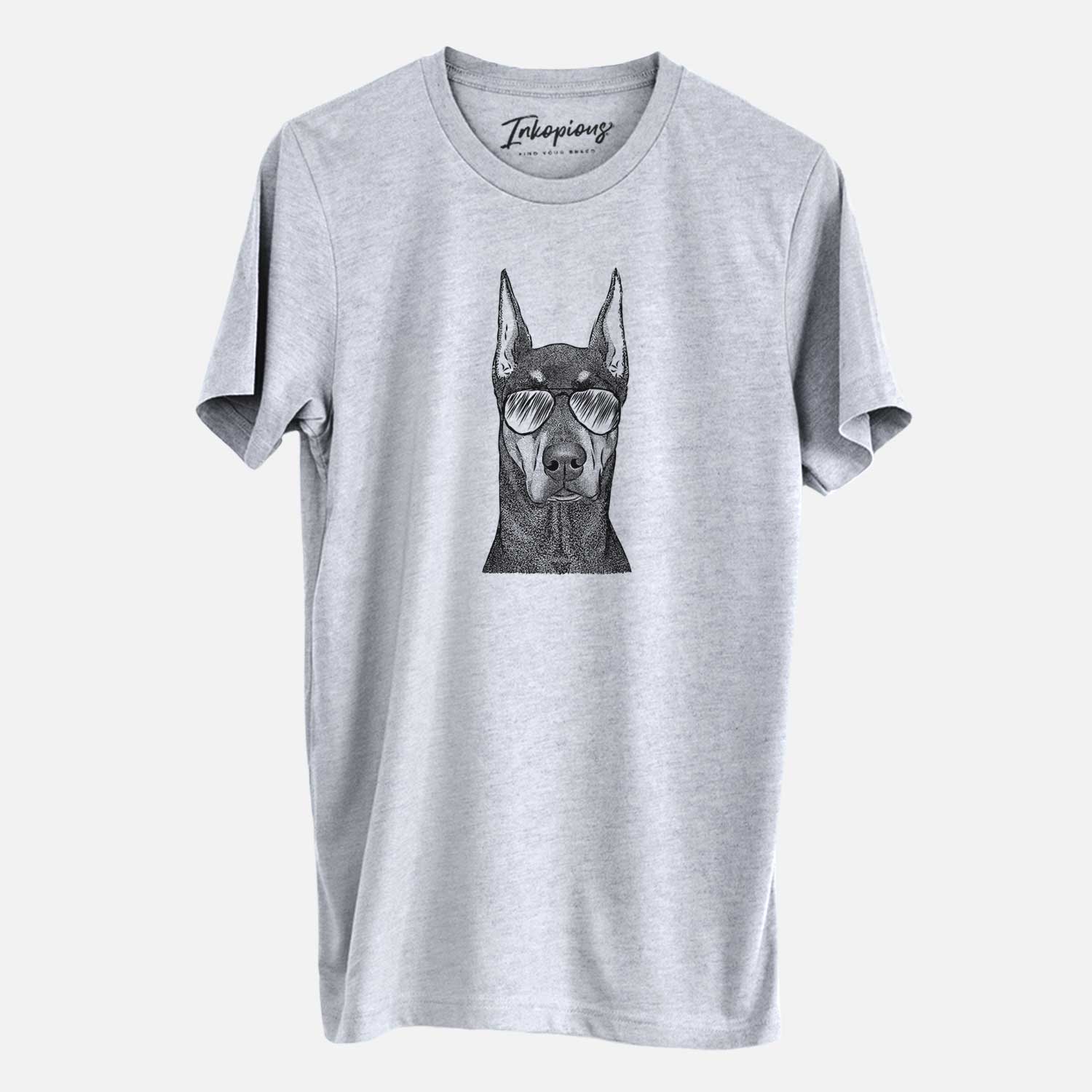 Hand-drawn sketch of Drake the Doberman Pinscher wearing aviator sunglasses on a Grey Unisex crewneck