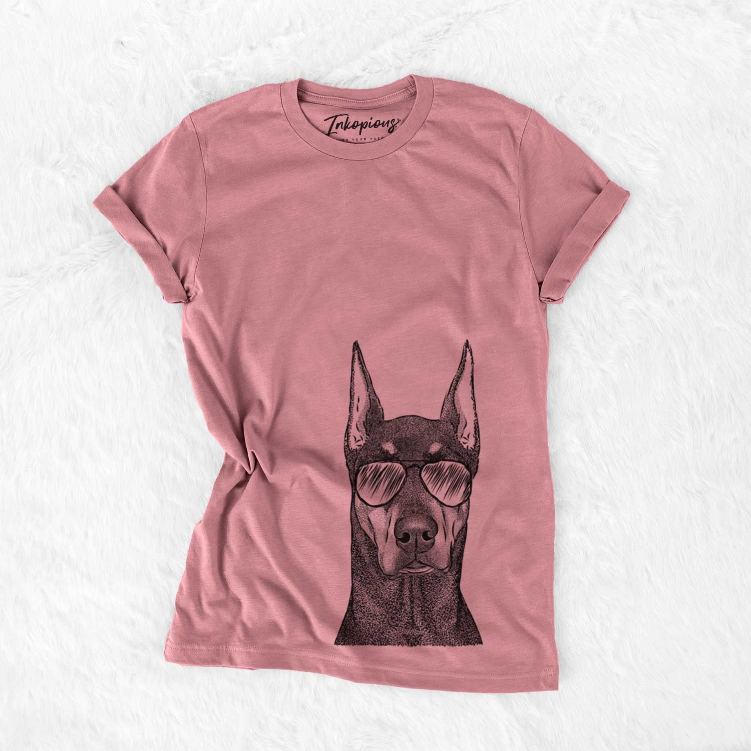 Hand-drawn sketch of Drake the Doberman Pinscher wearing aviator sunglasses on a Mauve Unisex crewneck