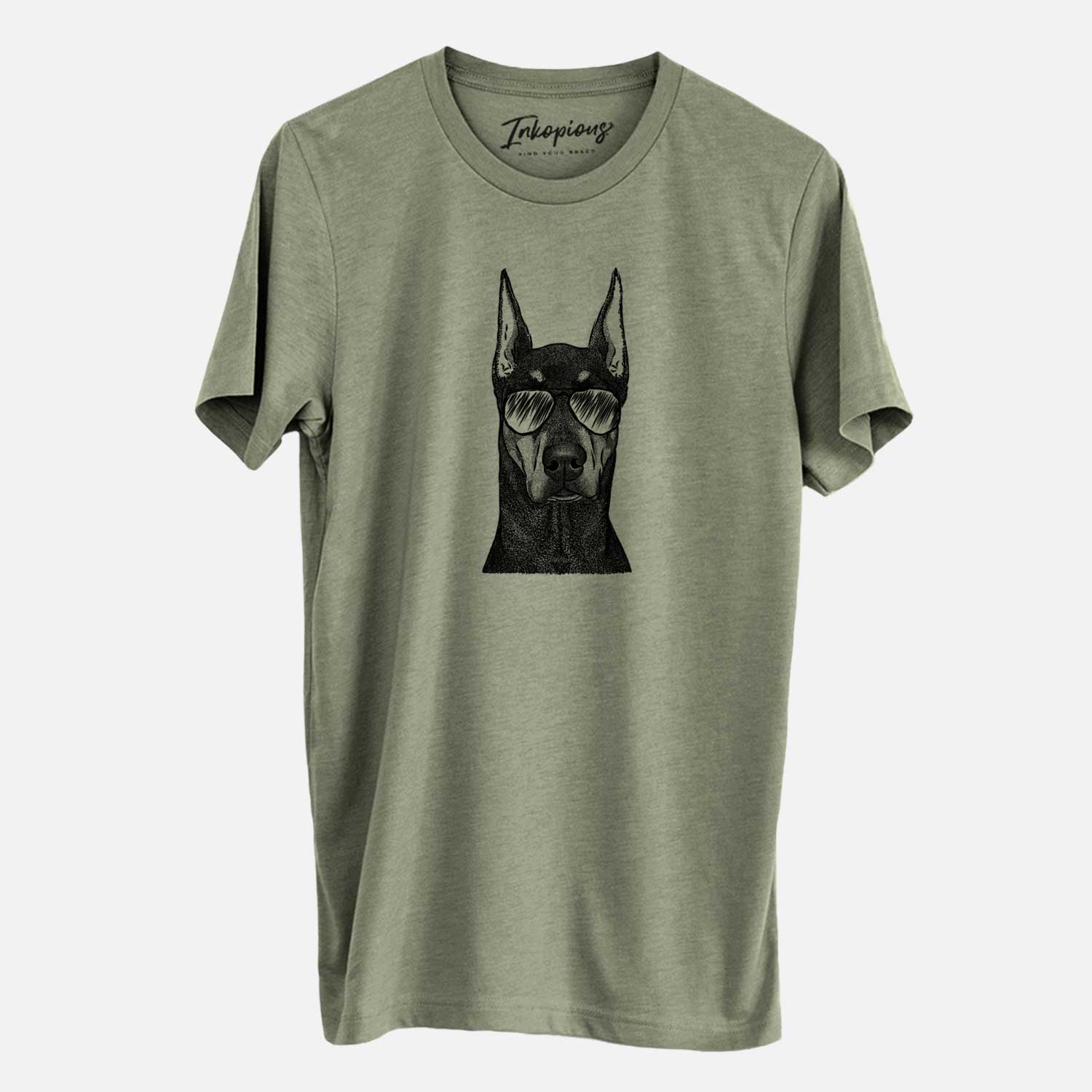 Hand-drawn sketch of Drake the Doberman Pinscher wearing aviator sunglasses on an Olive Unisex crewneck